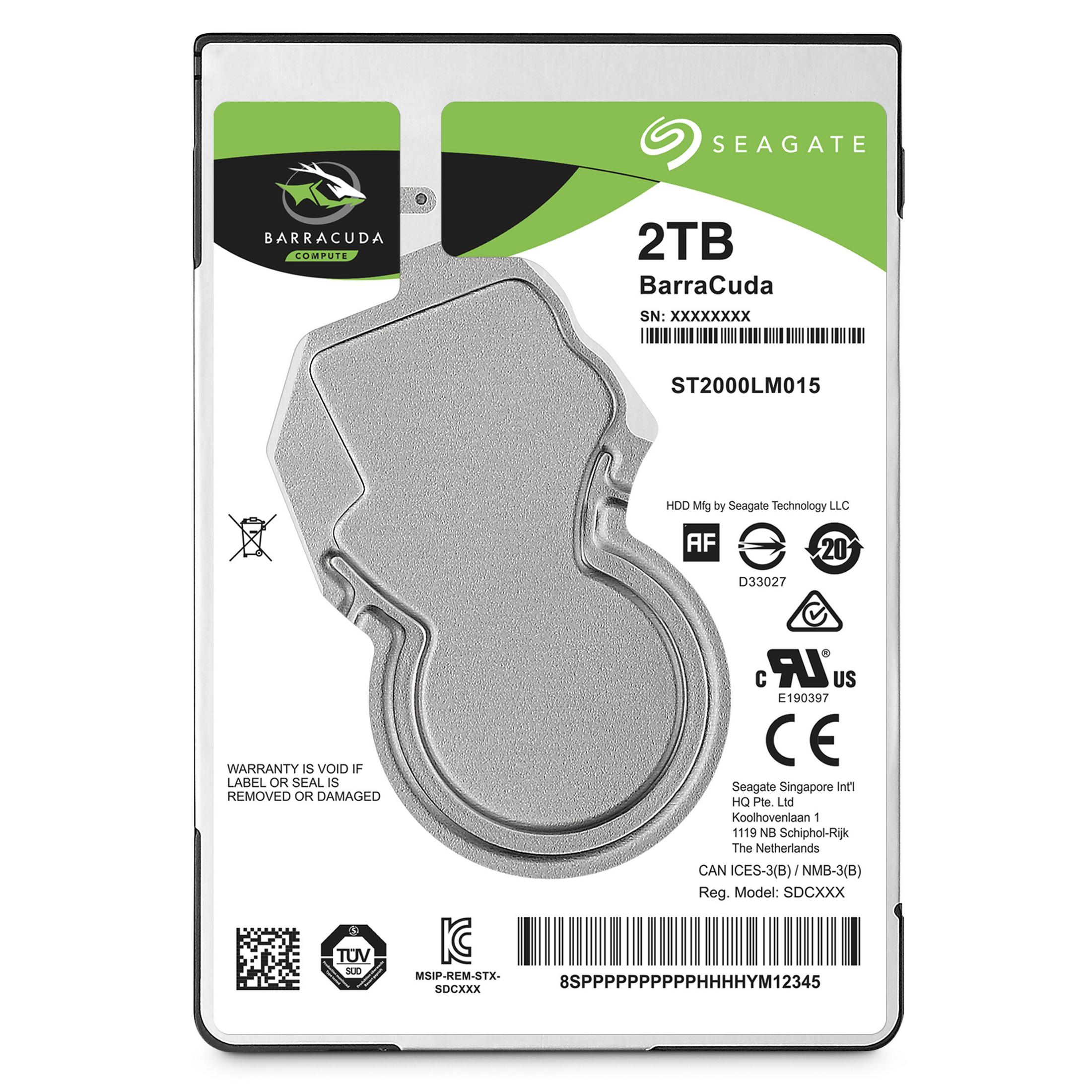 Dysk twardy Seagate Barracuda 2TB z etykietami, numerem seryjnym i certyfikatami bezpieczeństwa.