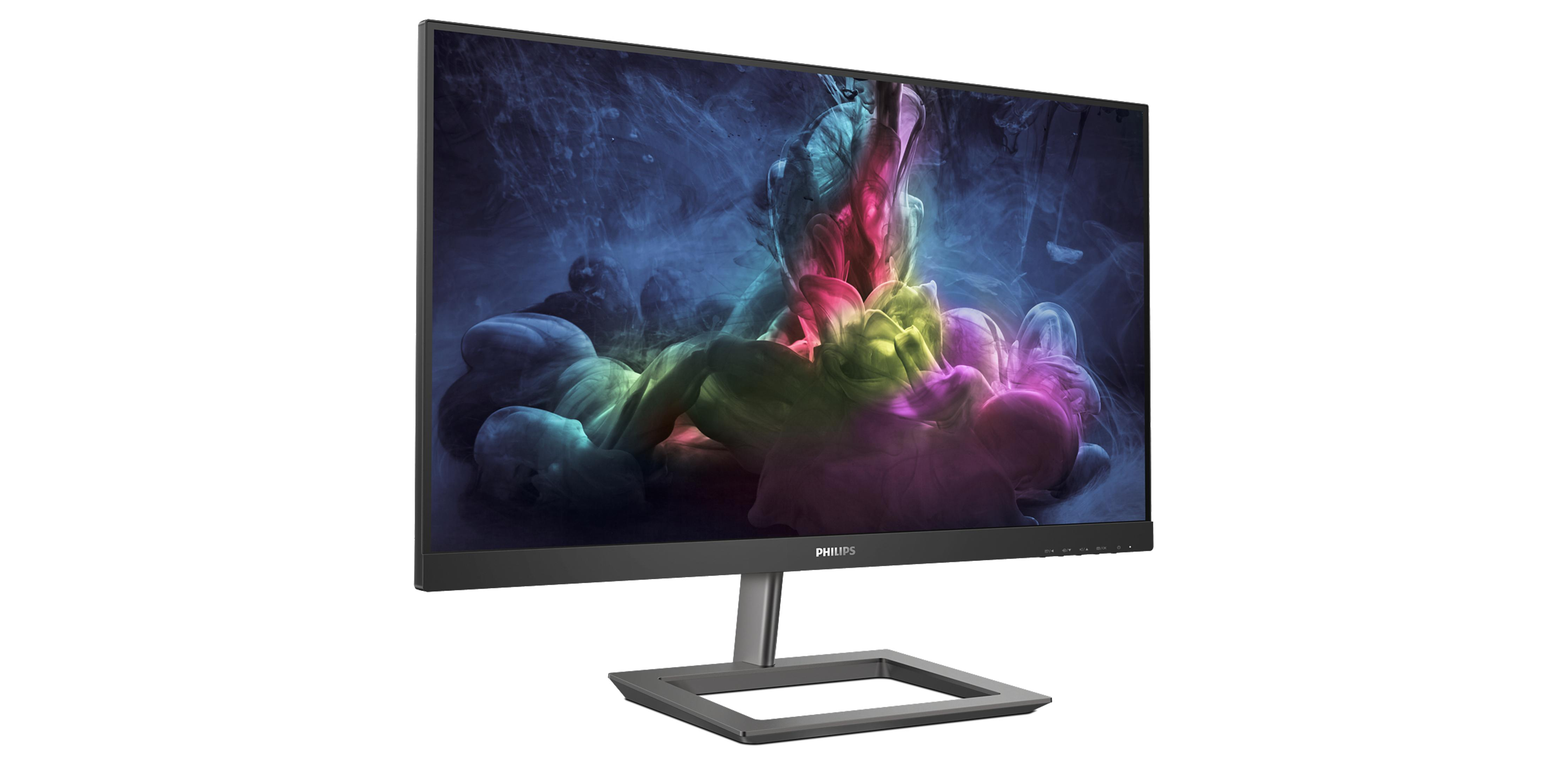Un moderno monitor per computer Philips che mostra arte astratta e colorata di fumo.