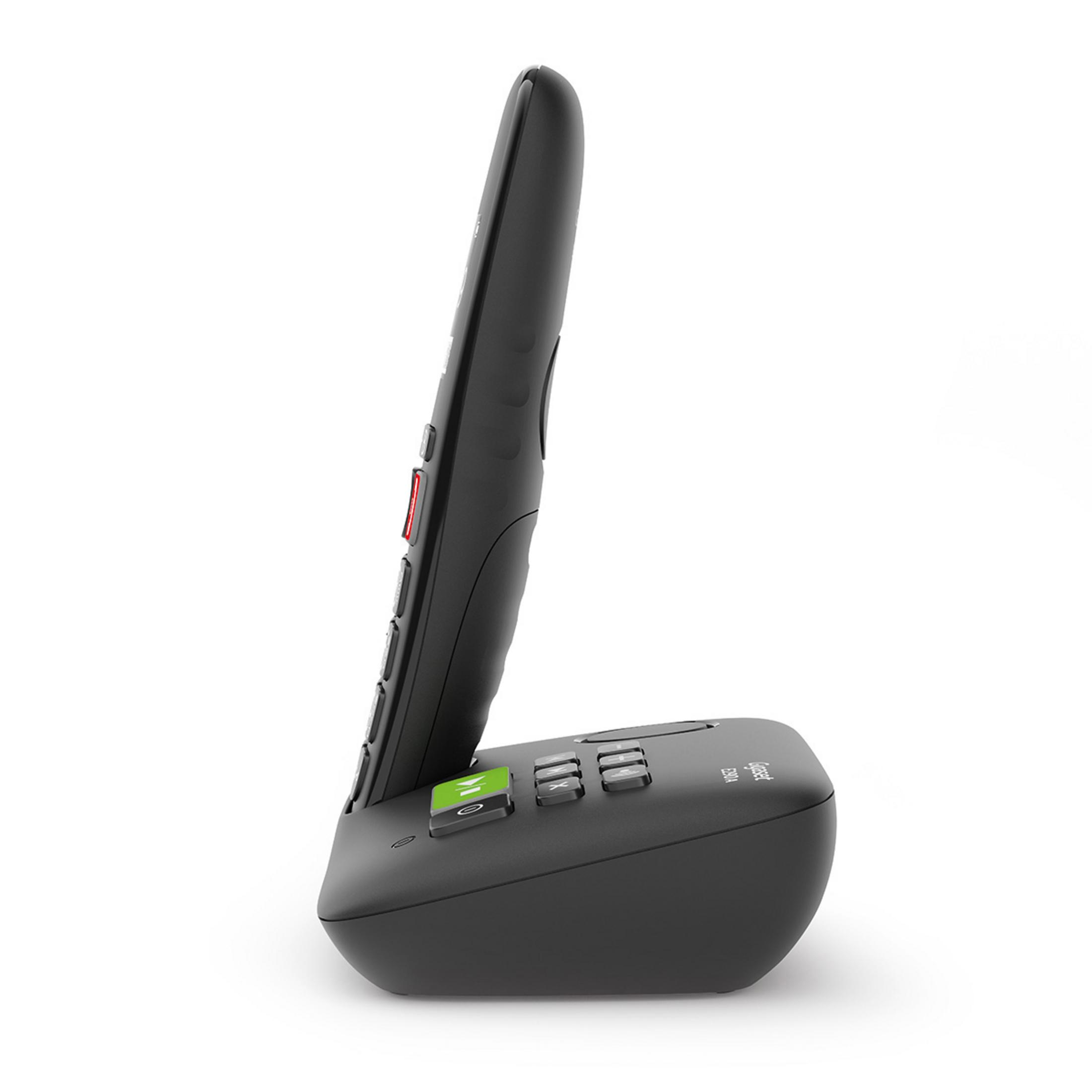 Teléfono inalámbrico negro con base, visto de lado.