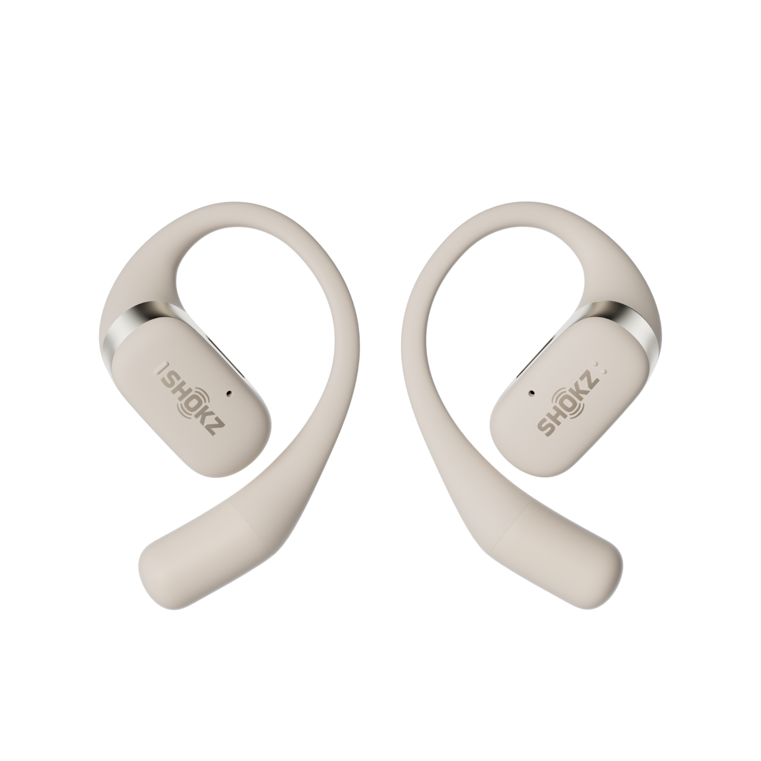 Dwa bezprzewodowe słuchawki w kolorze kości. Każdy ma zakrzywioną konstrukcję z haczykiem na ucho ze srebrnym akcentem.