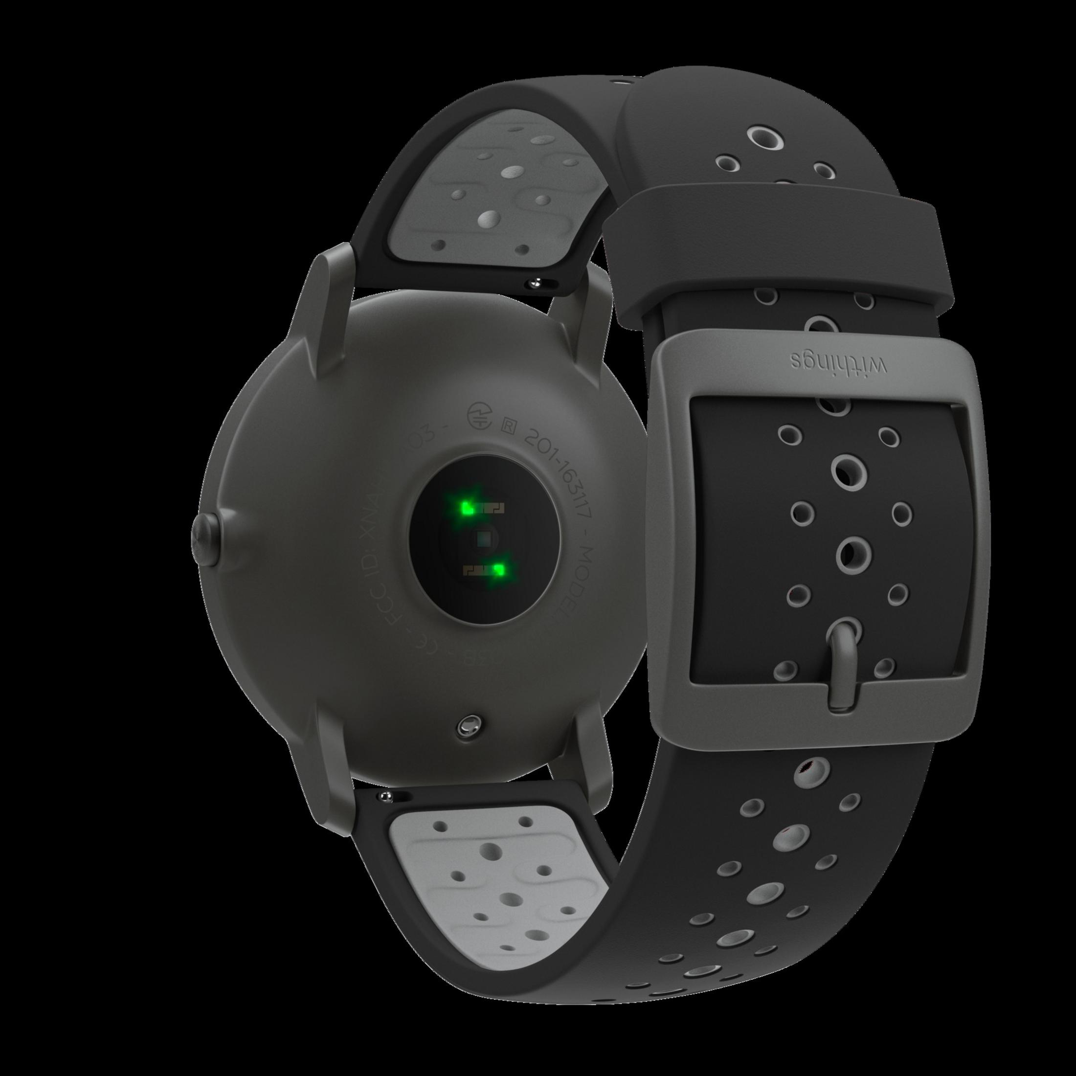Schwarze Smartwatch mit grauem Armband, grünes Licht auf der Rückseite, dunkler Hintergrund.