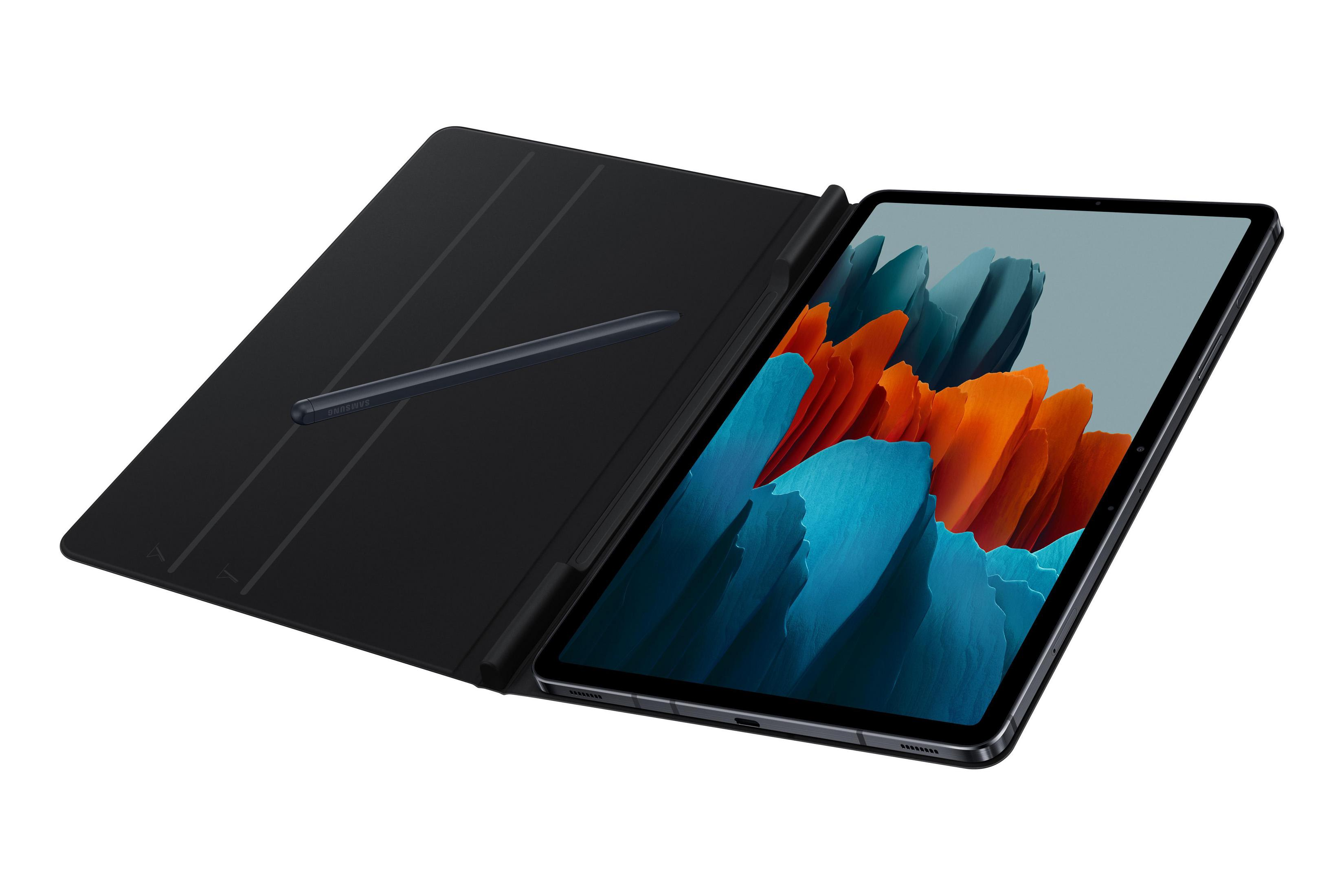 Tableta con funda de teclado y lápiz. La pantalla muestra una imagen abstracta colorida.