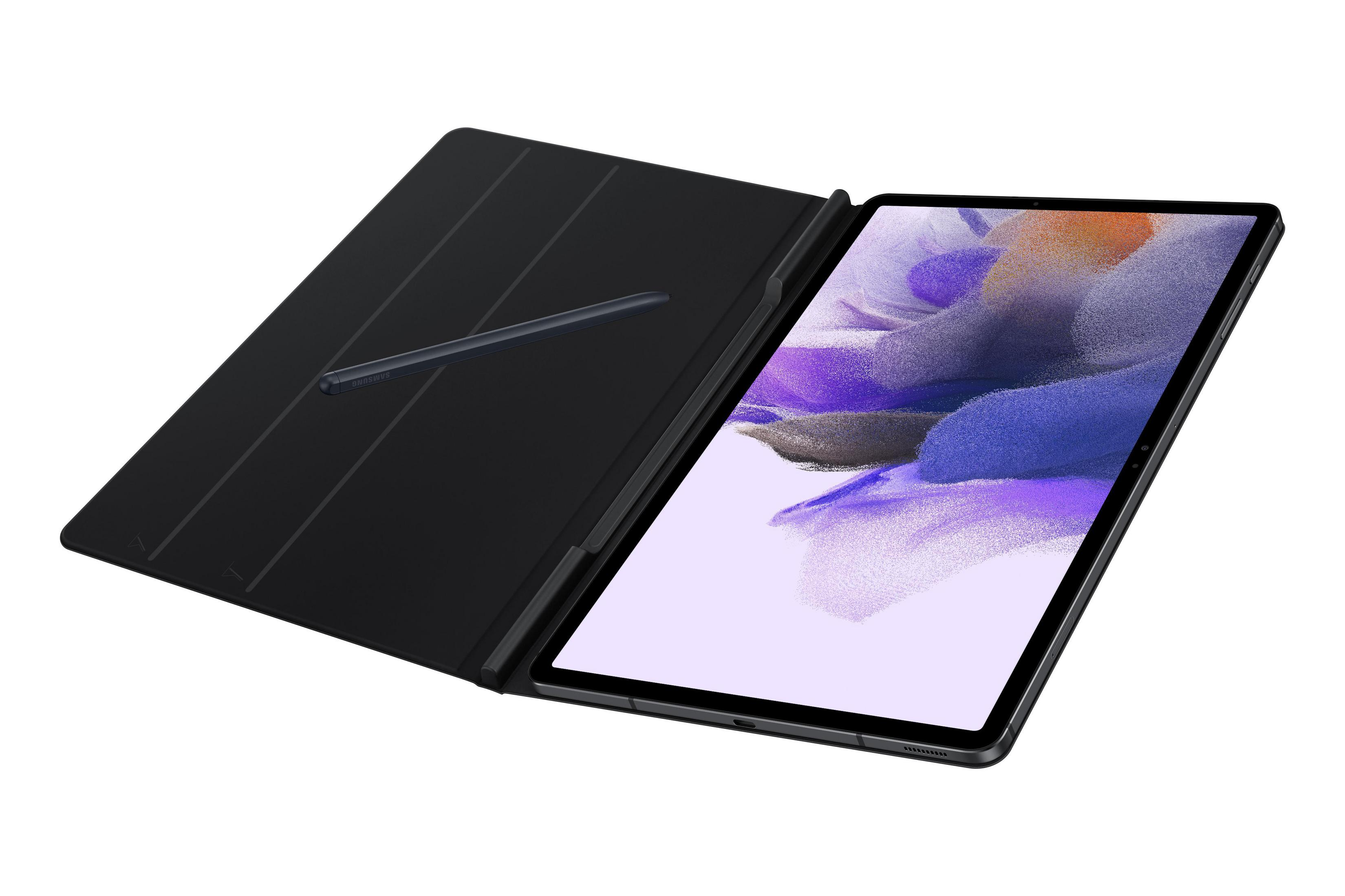 Tableta negra con un lápiz óptico en una funda folio negra. La pantalla muestra un fondo colorido.