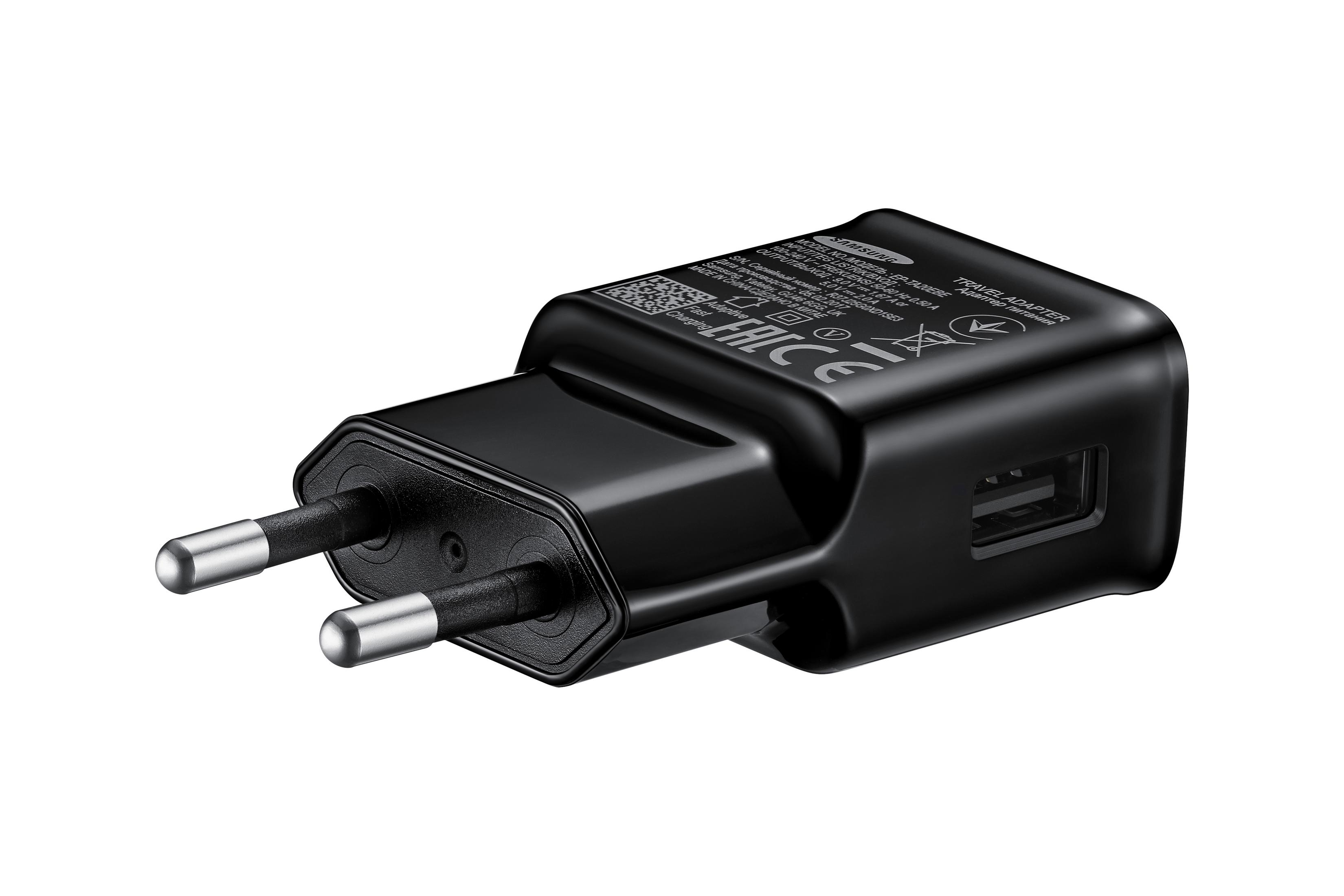 Een zwarte, rechthoekige telefoonoplader met twee pinnen en een USB-poort. Witte achtergrond.