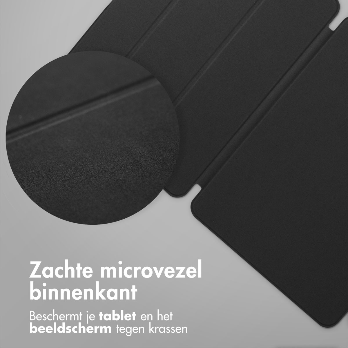 Close up of a black tablet case showing the soft microfiber inner side of the case.