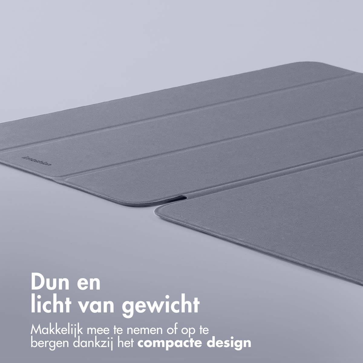 Two grey tablet cases. Text 'Dun en licht van gewicht' on the bottom left.