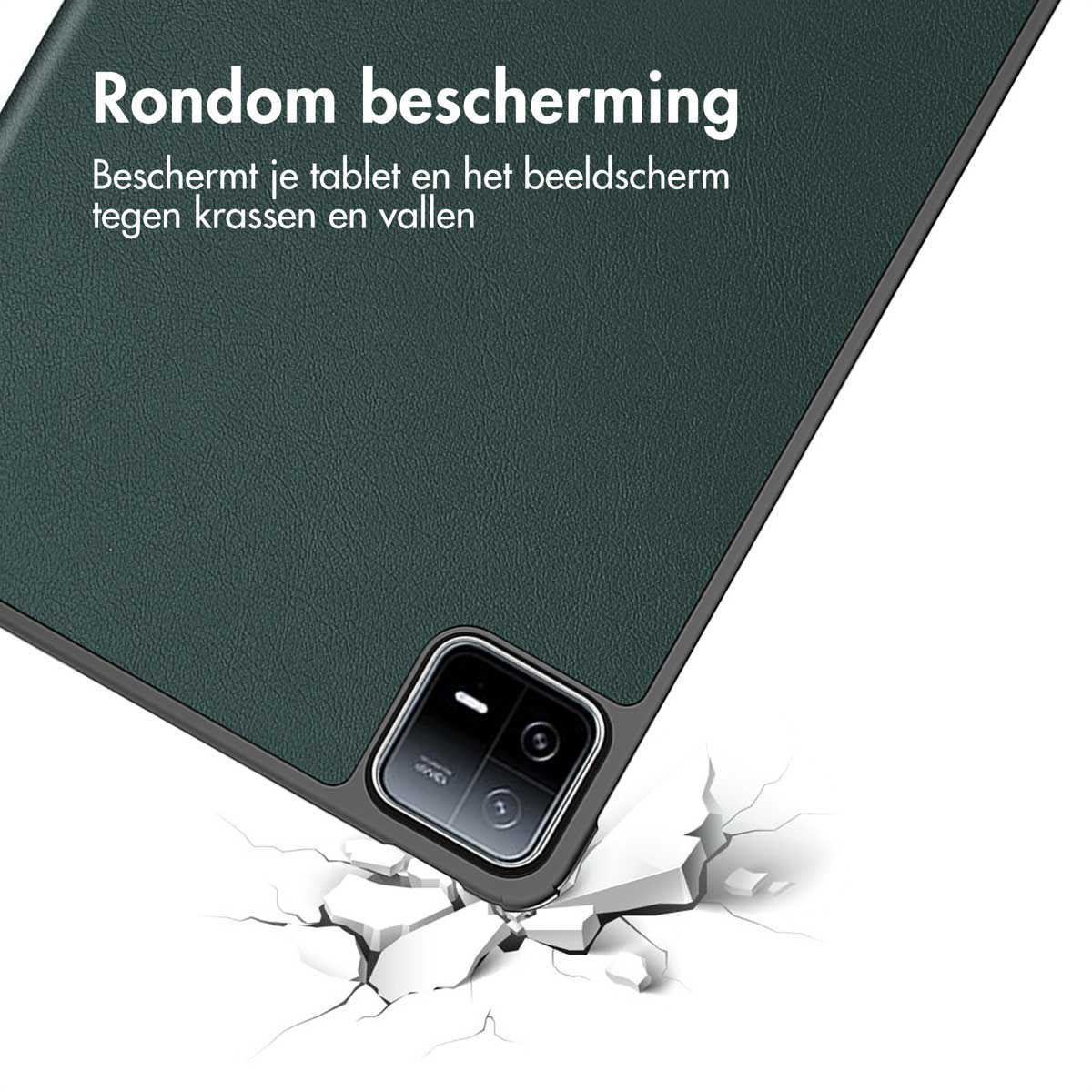 Dark green tablet case with camera, falling onto a cracked surface.