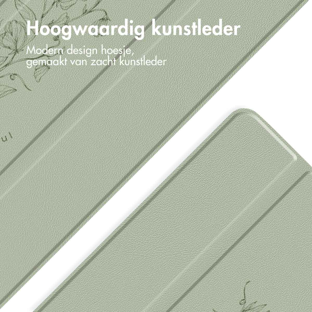 Close-up of a sage green tablet case with a floral design.