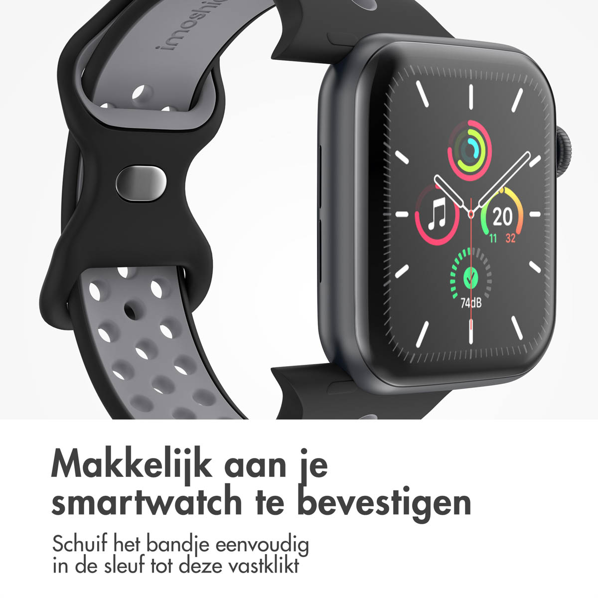 Black smartwatch band with ventilation holes and silver clasp attached.