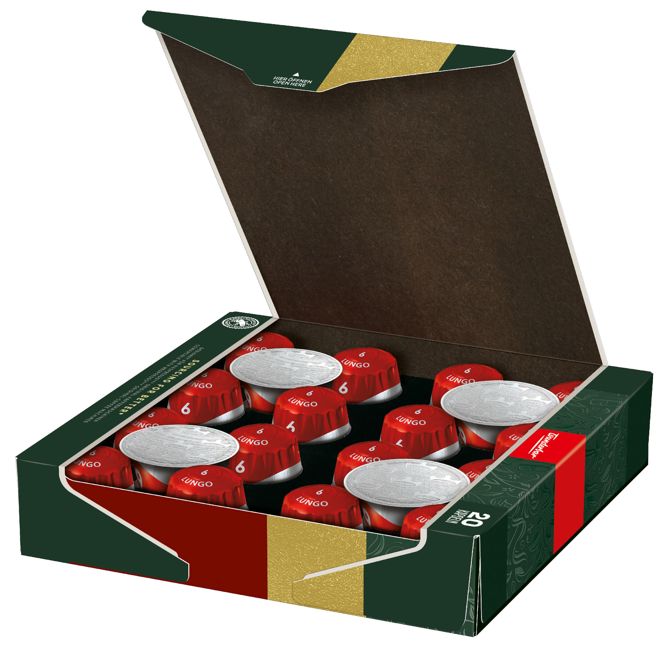 Schachtel mit roten und silbernen Kaffeekapseln. Die Schachtel ist grün und hat ein rotes Band.