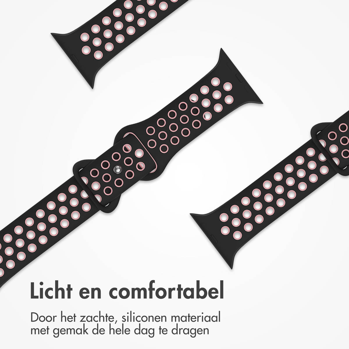 Black watch straps with pink holes are displayed against a white background. The straps are arranged in a diagonal pattern.