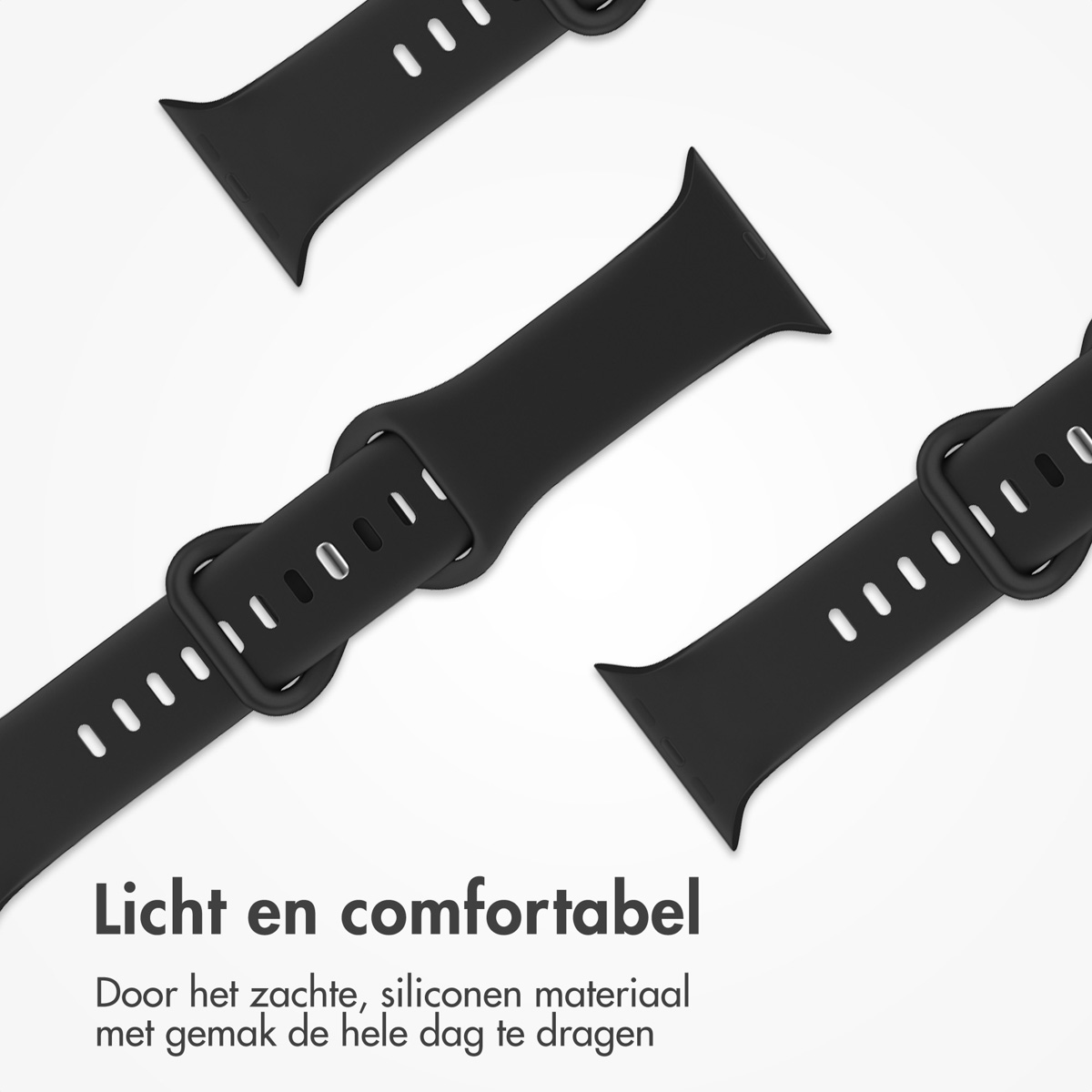 Three black watch bands with holes for the band pin. They are on a white surface.