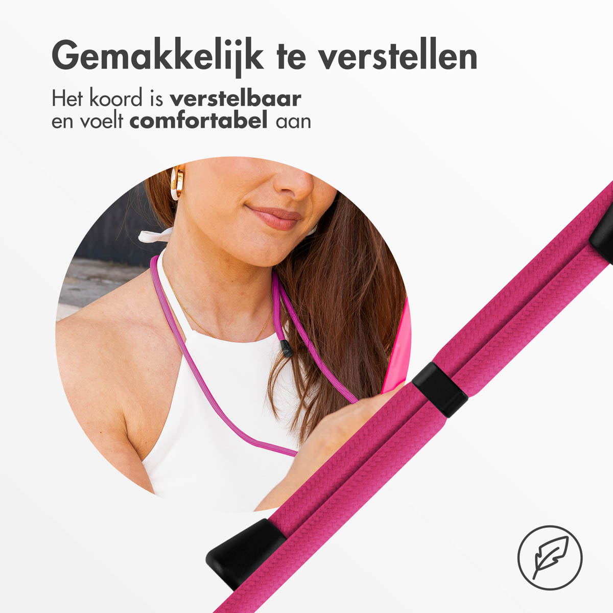 Nahaufnahme des Gesichts einer Frau. Sie trägt Ohrringe und ein rosa Seil.