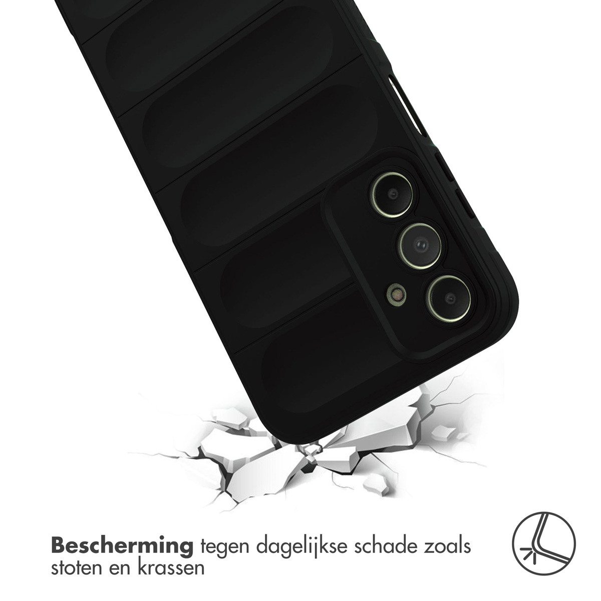 Coque de téléphone noire nervurée tombant sur un sol fissuré.