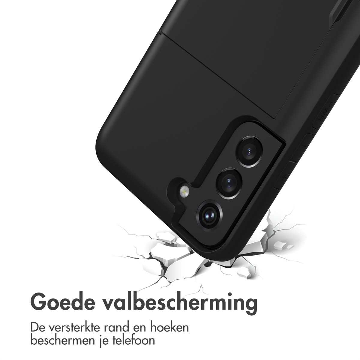 Zwarte telefoonhoes met camera-uitsparing die op gebarsten grond valt.