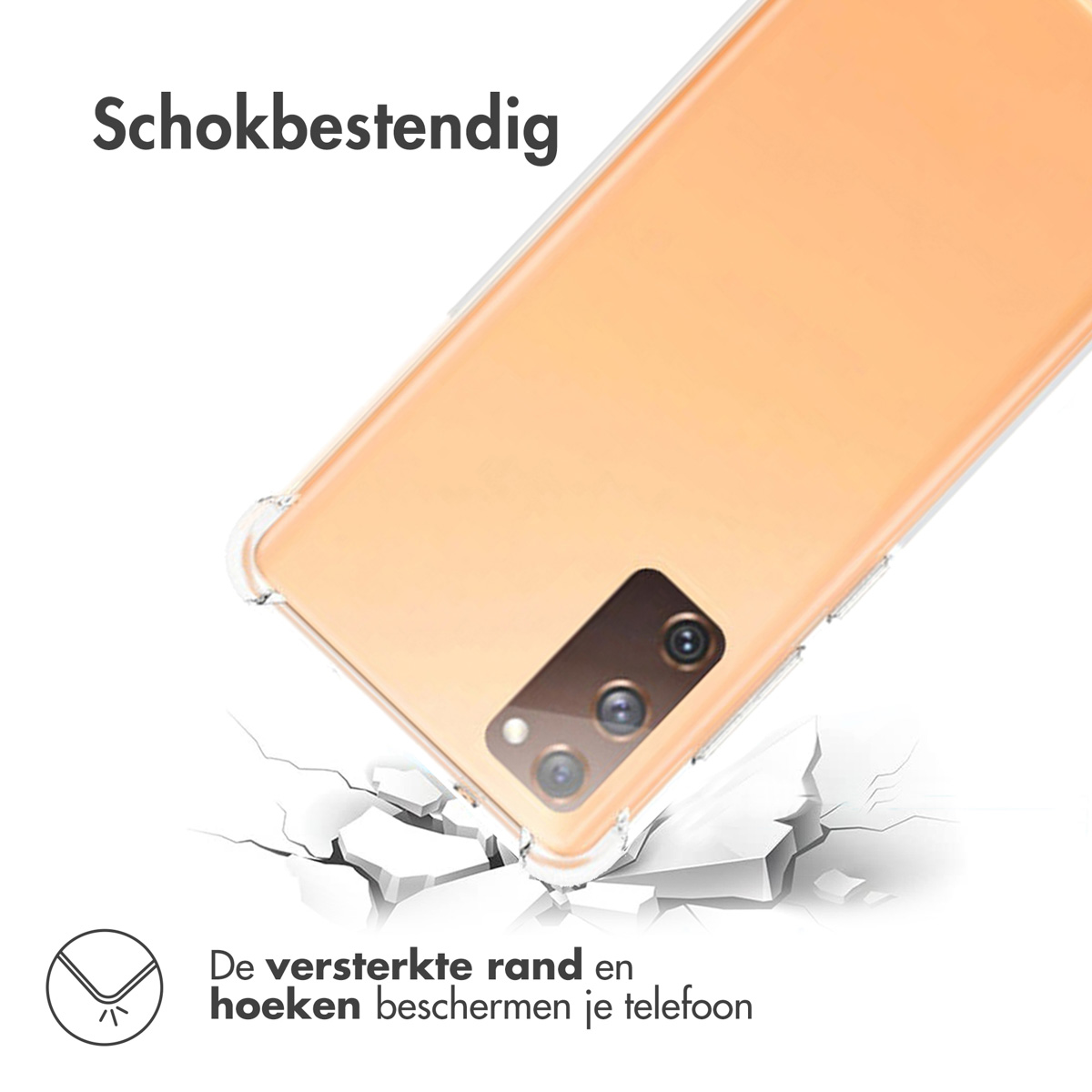 Oranje telefoonhoes. De telefoon valt, raakt de grond en veroorzaakt scheuren.