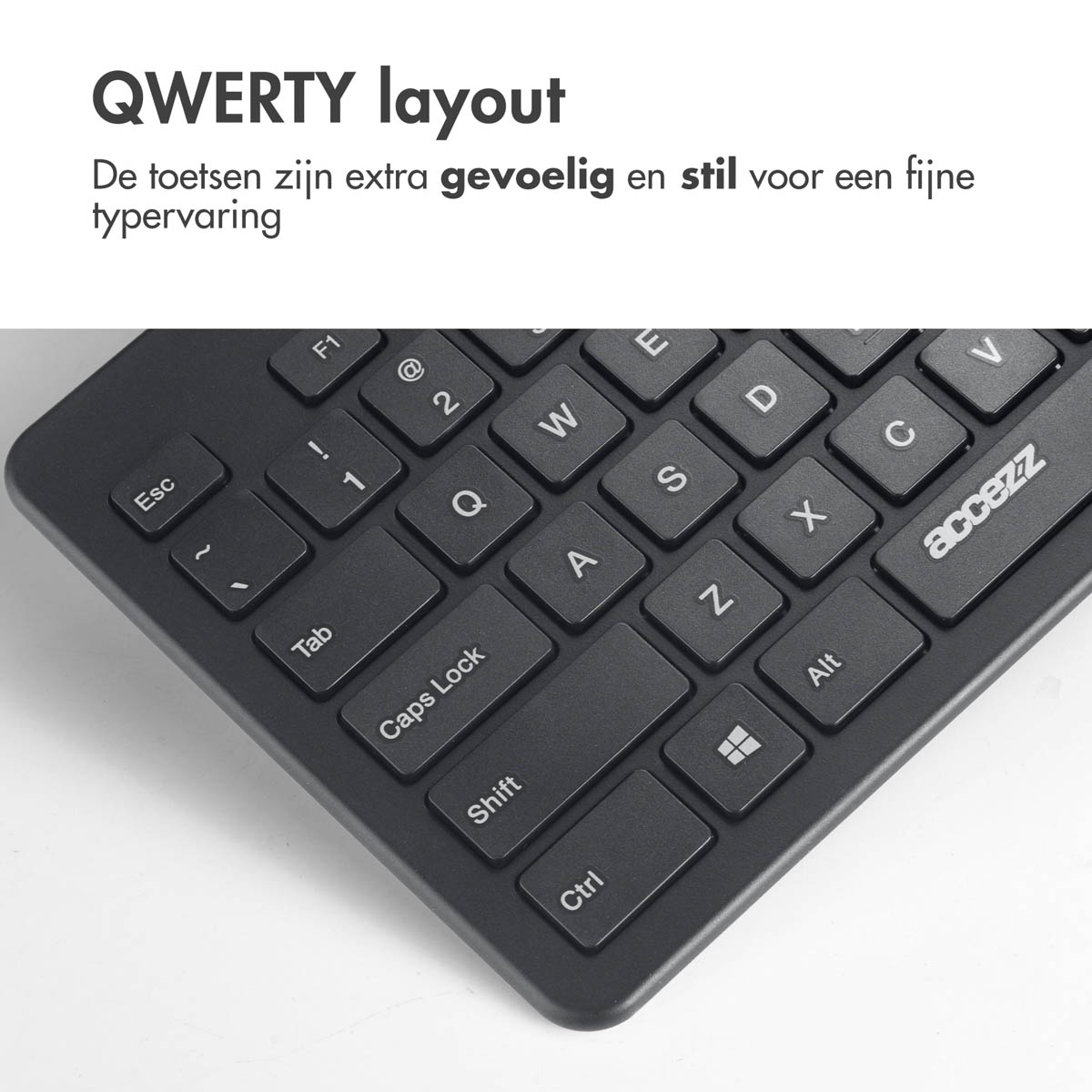 Primo piano di una tastiera QWERTY nera con tasti come Esc, Tab, Blocco Maiusc, Shift, Ctrl e F1.