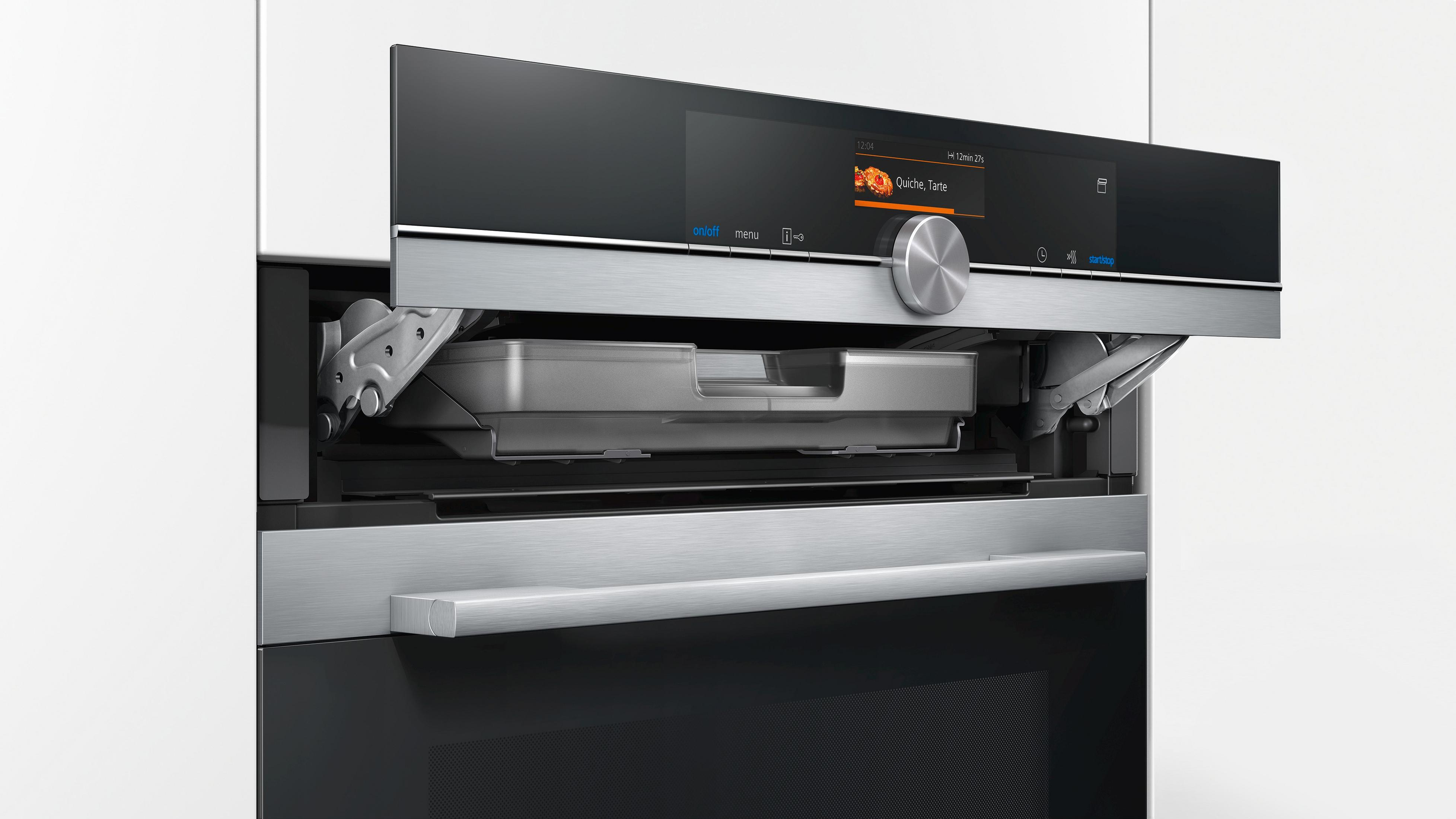Horno empotrado con pantalla y cajón de bandeja.