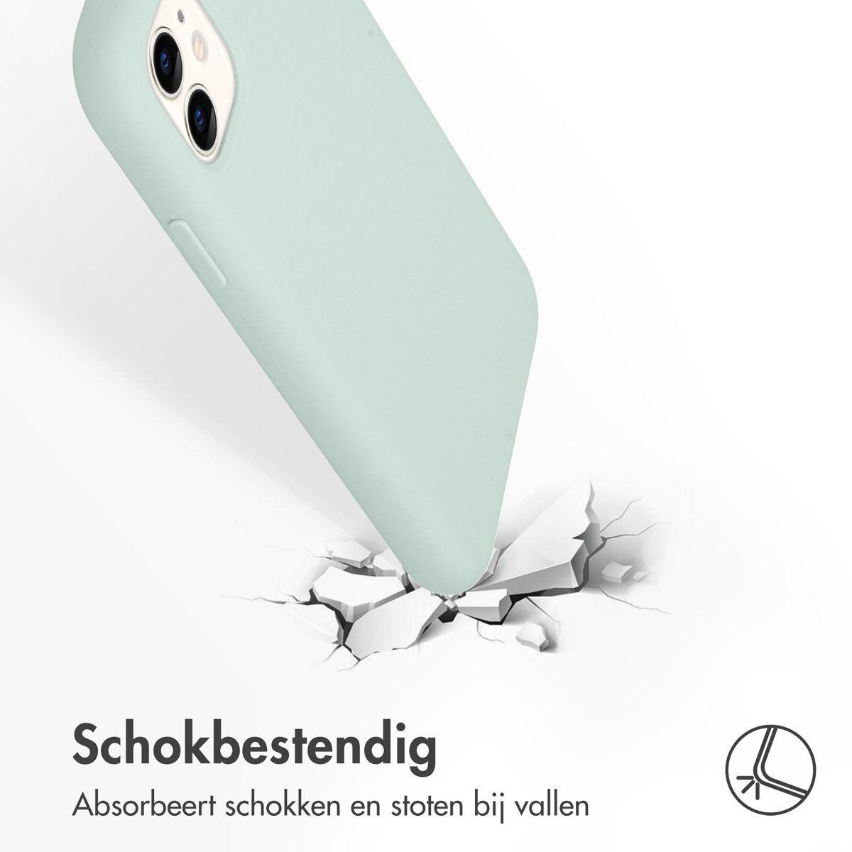 Een lichtgroene telefoonhoes raakt een gebarsten witte ondergrond.