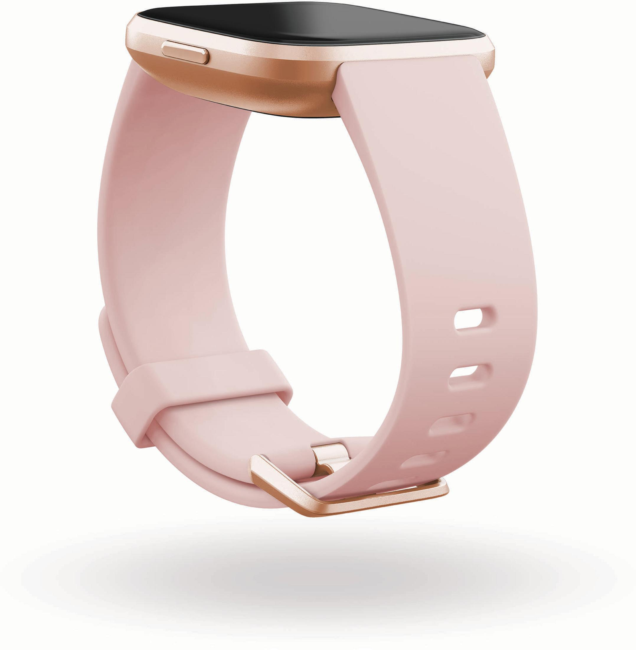 Smartwatch rosa con carcasa y correa doradas, sobre fondo blanco.