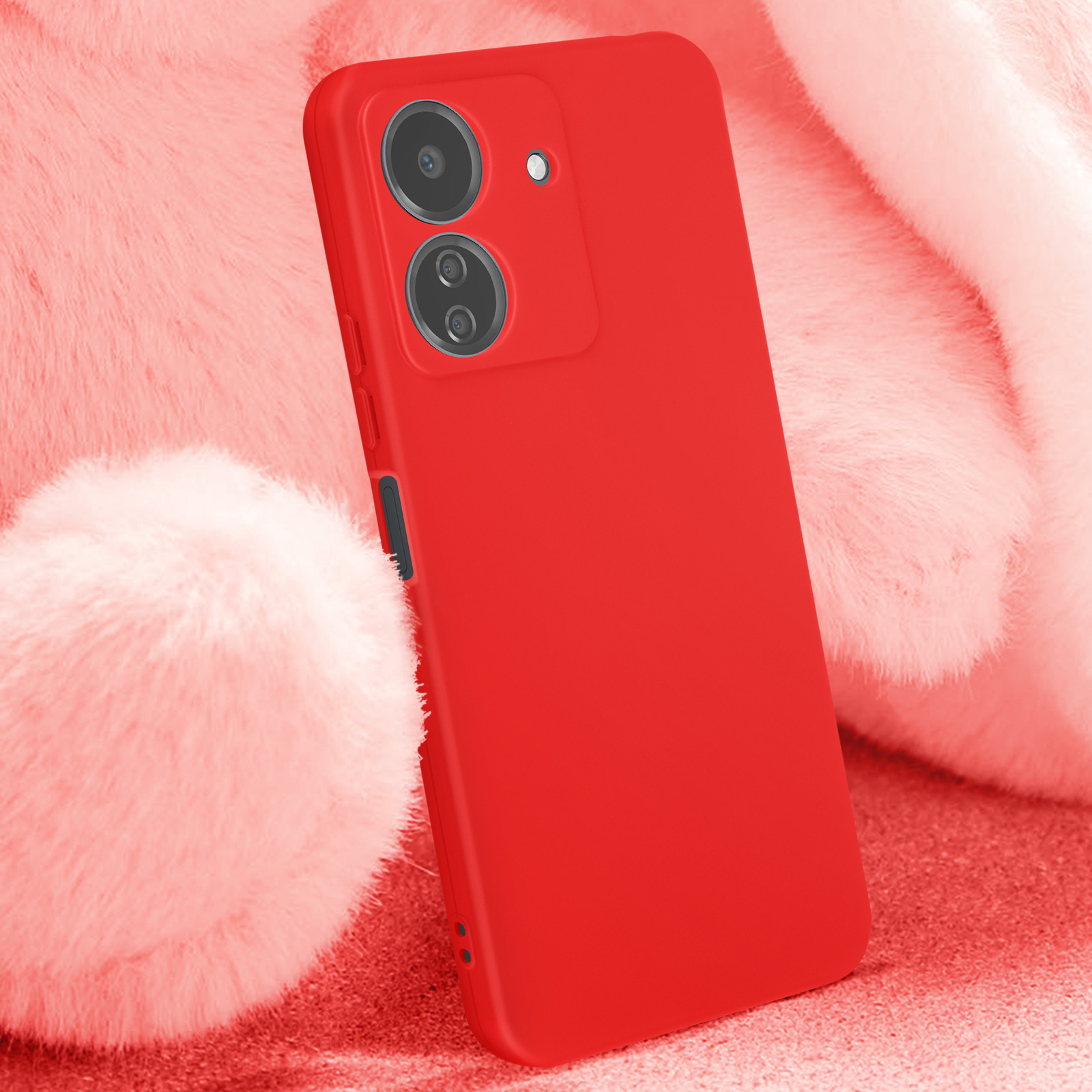 Custodia rossa del telefono su sfondo rosso sfocato. La custodia copre il telefono.