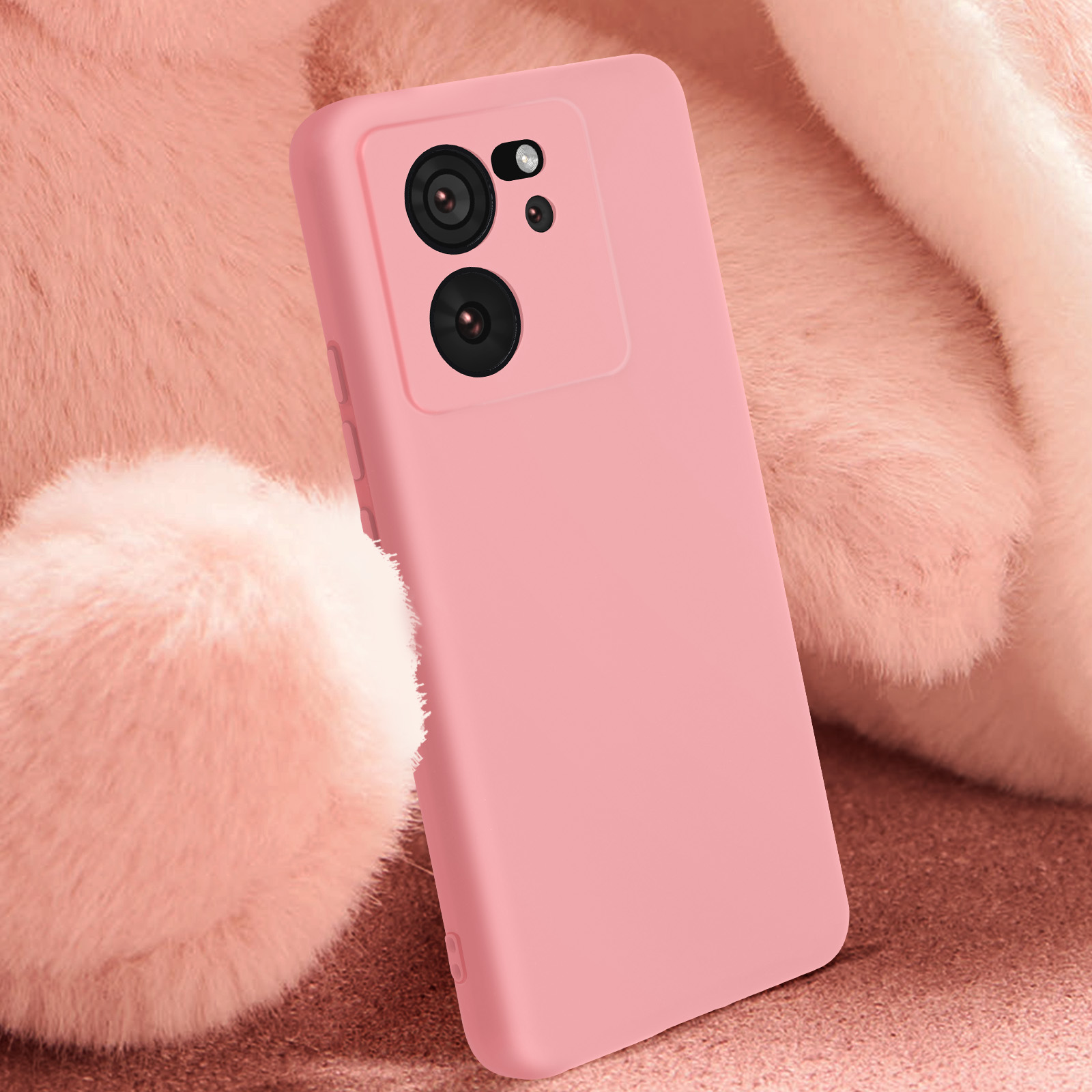 Roze telefoonhoesje. Toont camera's en een lichtroze achtergrond.