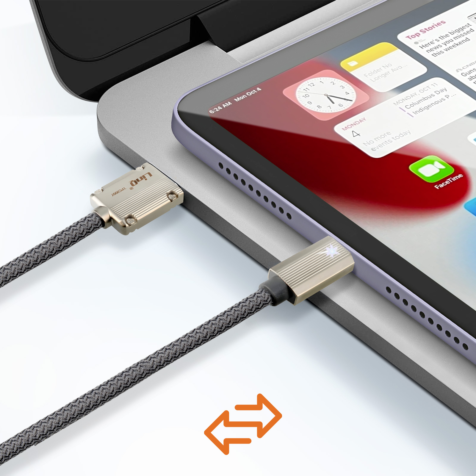 Cavo del tablet in carica. Connettori argentati e cavo grigio. L'interfaccia mostra calendario e FaceTime.