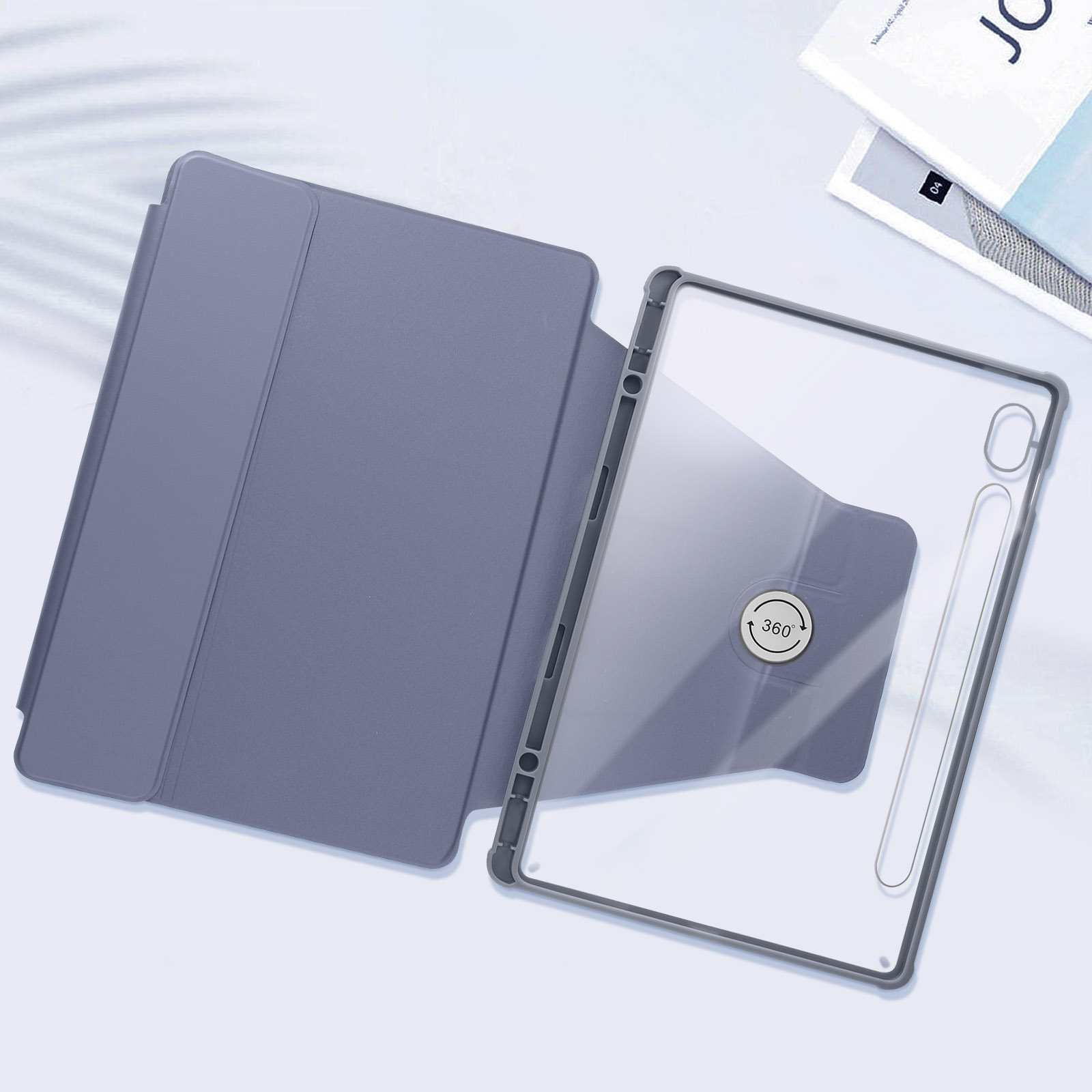 Custodia per tablet. È grigia e ha una copertura parzialmente aperta. Superficie bianca.