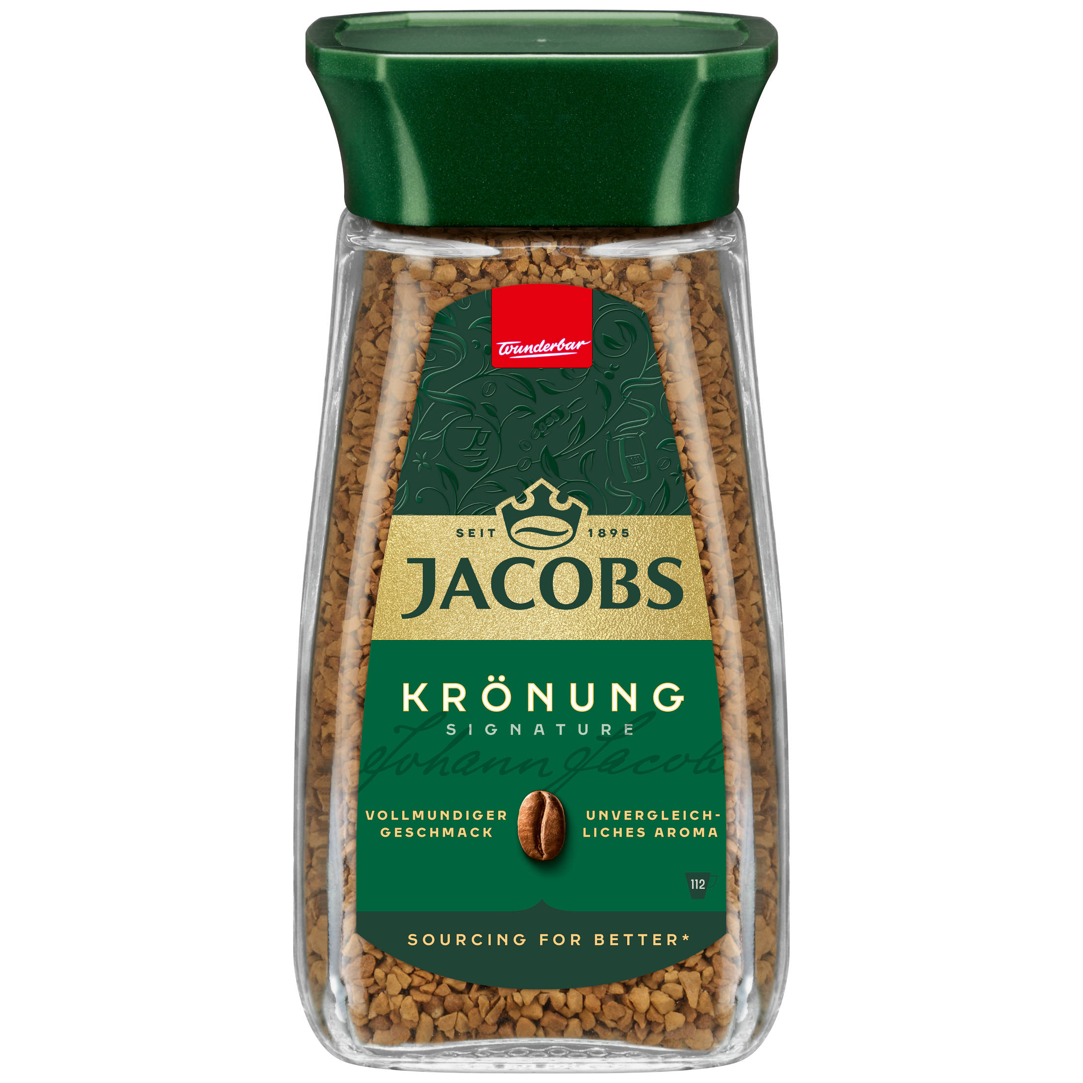 Ein Glas Jacobs Krönung Kaffee. Das Glas ist braun mit grünem und goldenem Etikett.