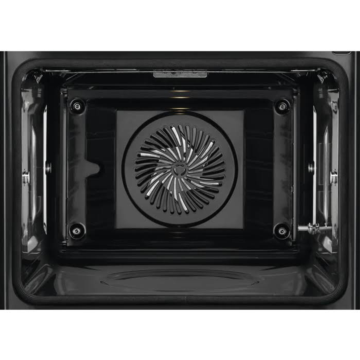 Interior de un horno, con ventilador y elemento calefactor.