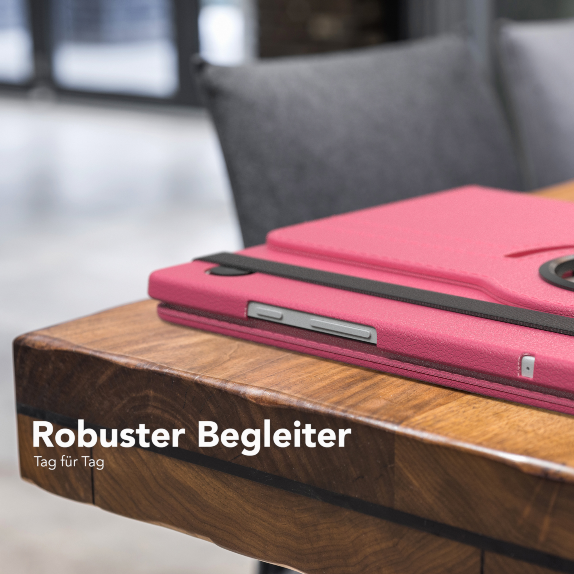 Rosa Tablet-Hülle auf Holztisch. Text: 'Robuster Begleiter' und 'Tag für Tag'.