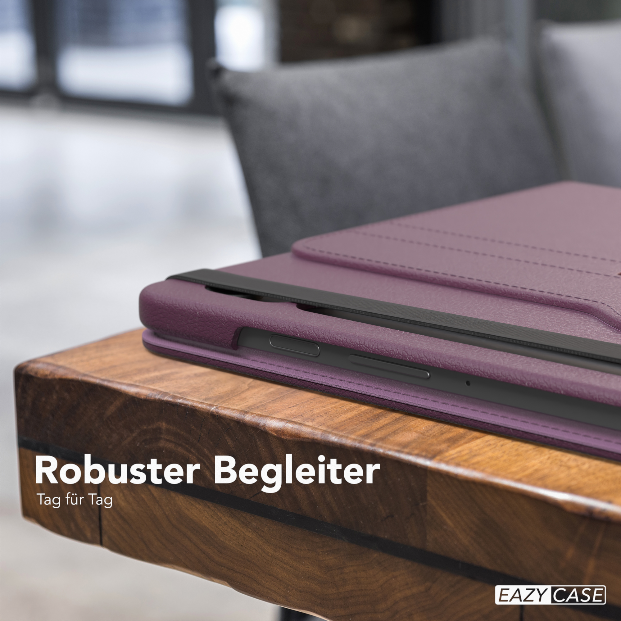 Eine lila Tablet-Hülle auf einem Holztisch. Text: 'Robuster Begleiter' und 'Tag für Tag'.