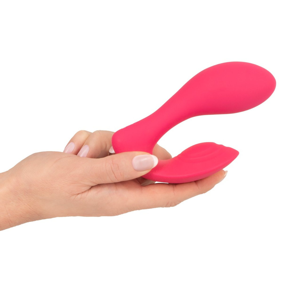 Eine Hand, die ein pinkfarbenes Sexspielzeug hält. Das Spielzeug hat eine gebogene Form.