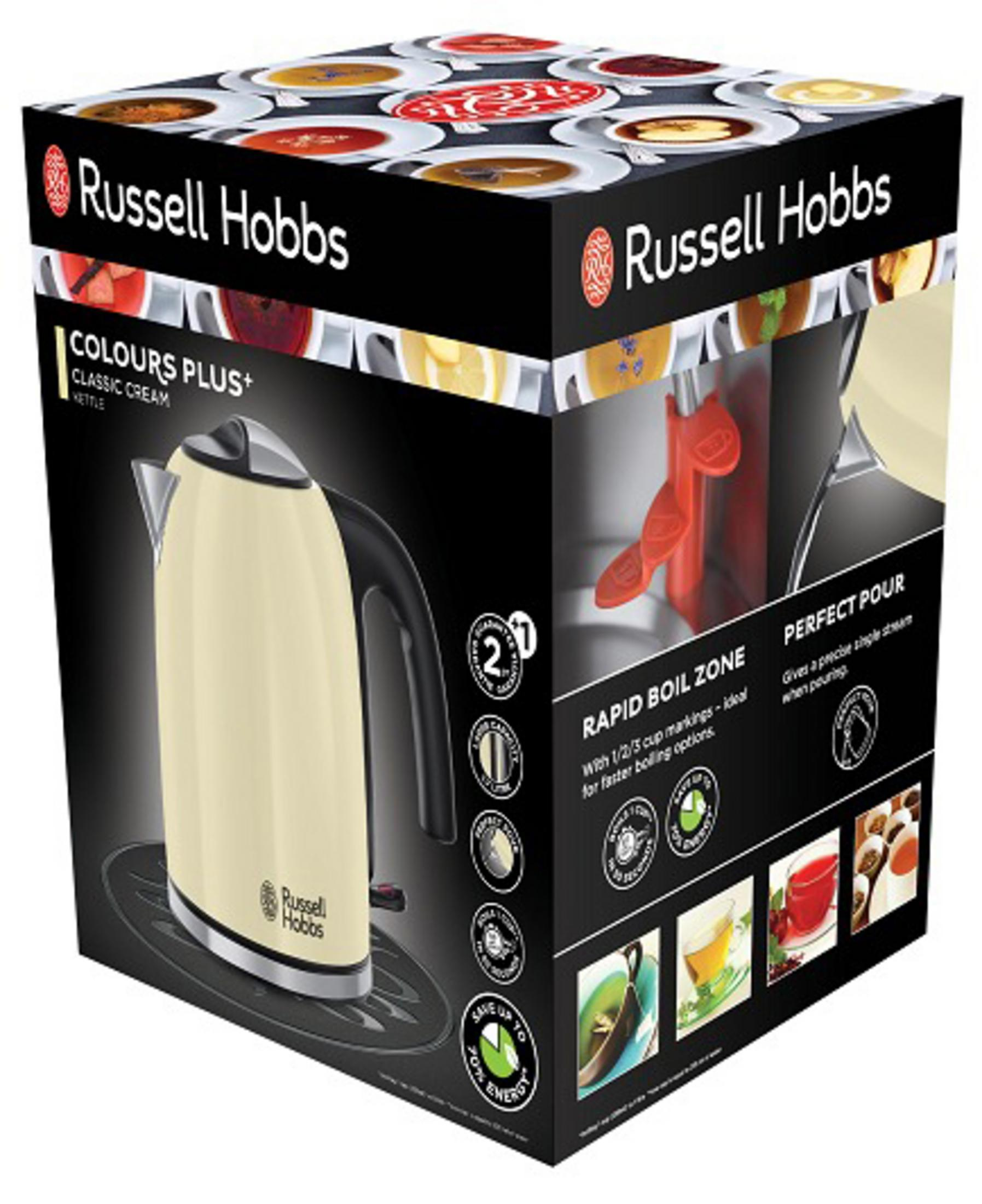 Verpackte Russell Hobbs Wasserkocher. Cremefarbener Wasserkocher, schwarzer Griff, Box mit Bildern.