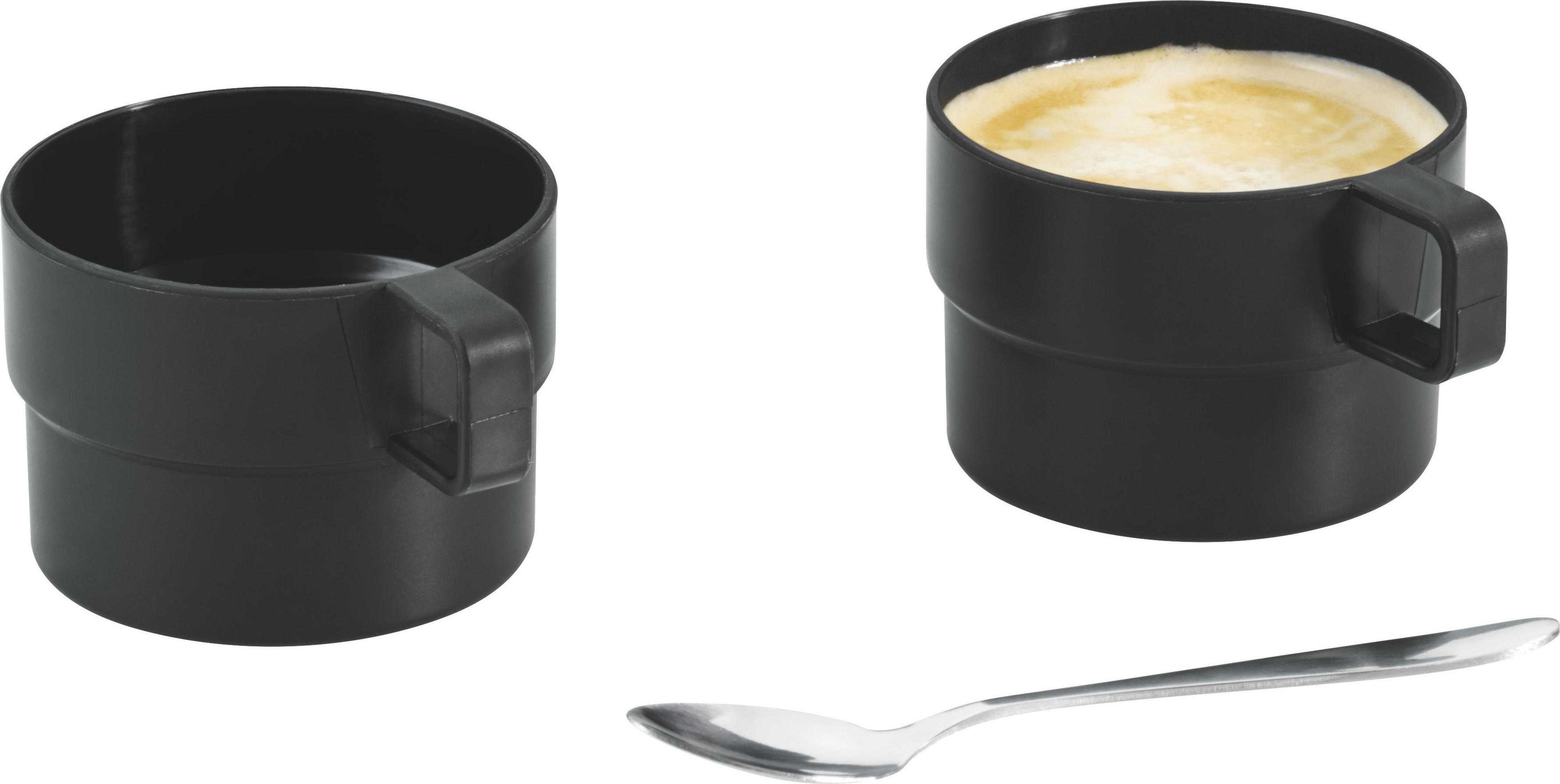 Dwa czarne kubki z uchwytami i srebrna łyżka. Jeden kubek jest pusty, drugi ma śmietankę.