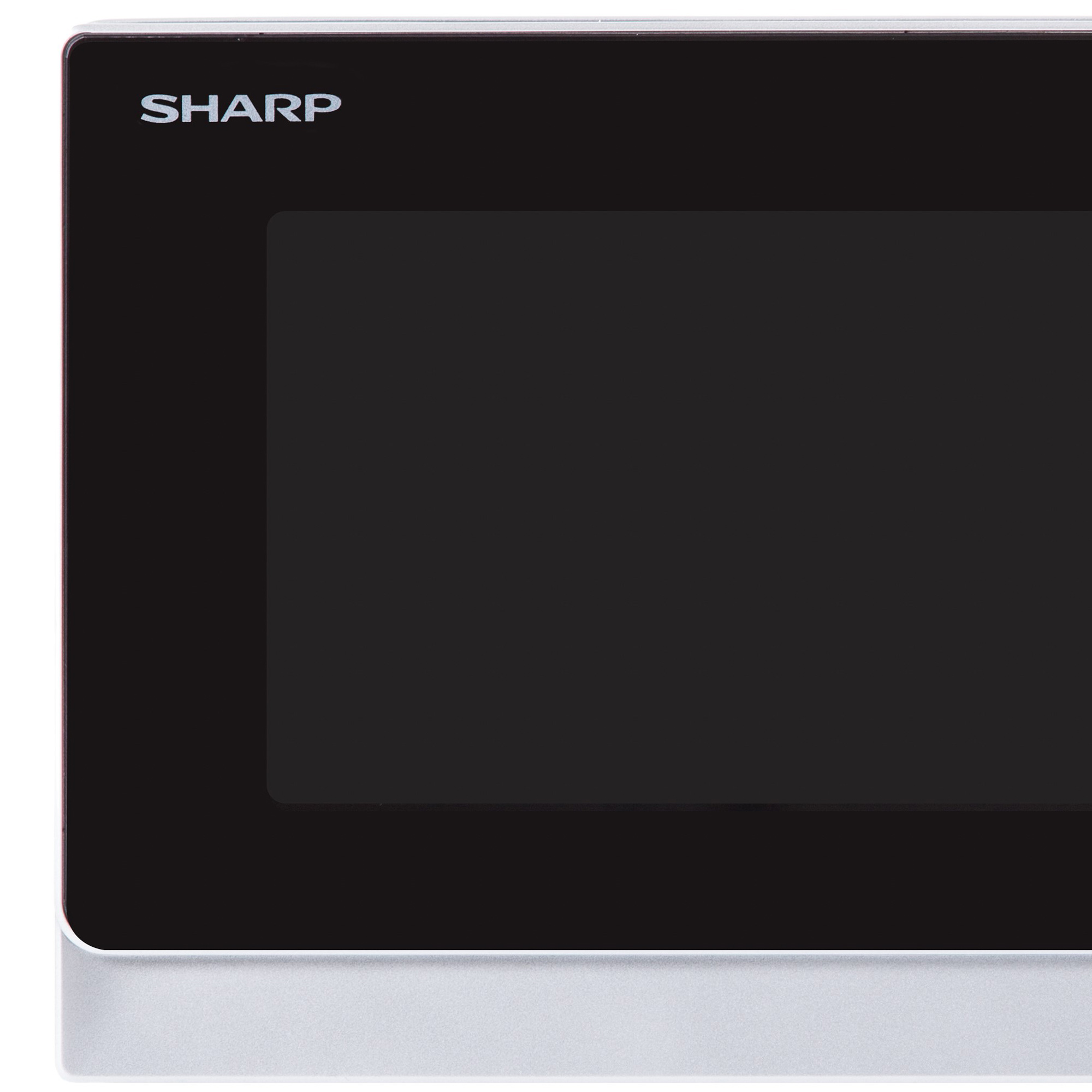 Primo piano di un forno a microonde nero con logo SHARP e porta in vetro scuro.