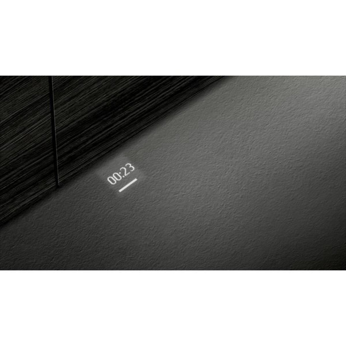 Surface noire avec un affichage de minuterie 00:23 lumineux.