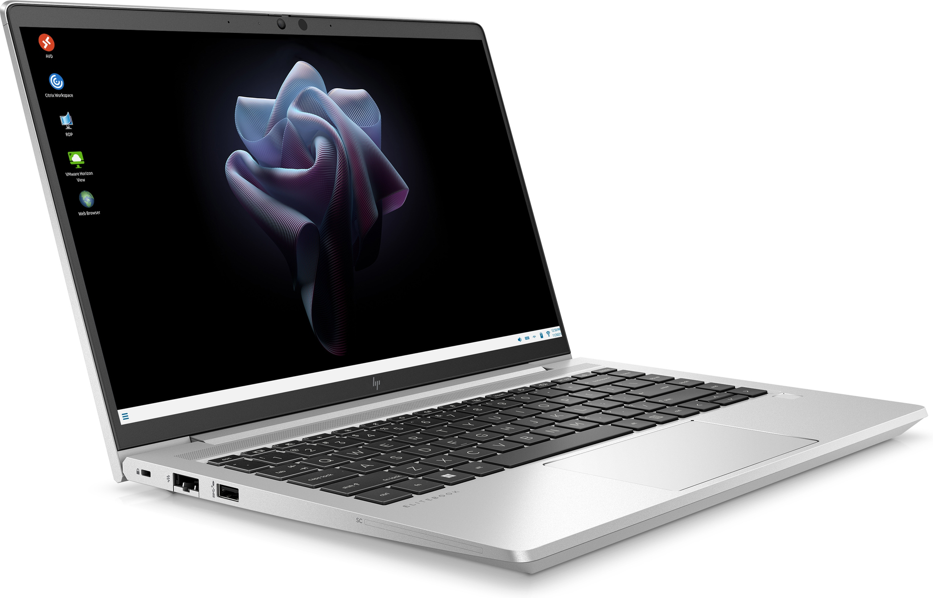 Ordinateur portable argenté avec clavier noir. L'écran affiche un fond sombre avec une forme abstraite 3D. Diverses icônes d'applications sont visibles.