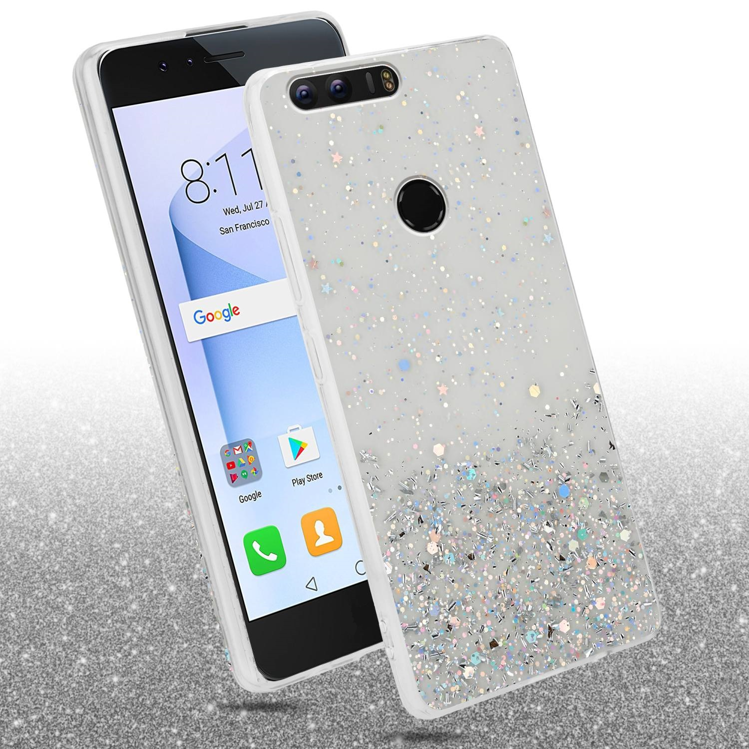 Un telefono con una custodia. La custodia è glitterata. Un secondo telefono è dietro la custodia. Sfondo glitterato.