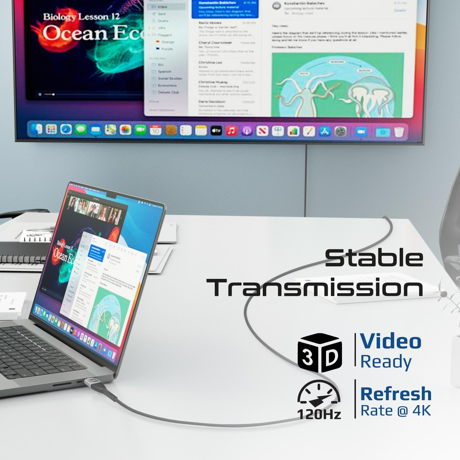 Un portátil muestra una pantalla con una videollamada, una pantalla más grande muestra un sitio web.