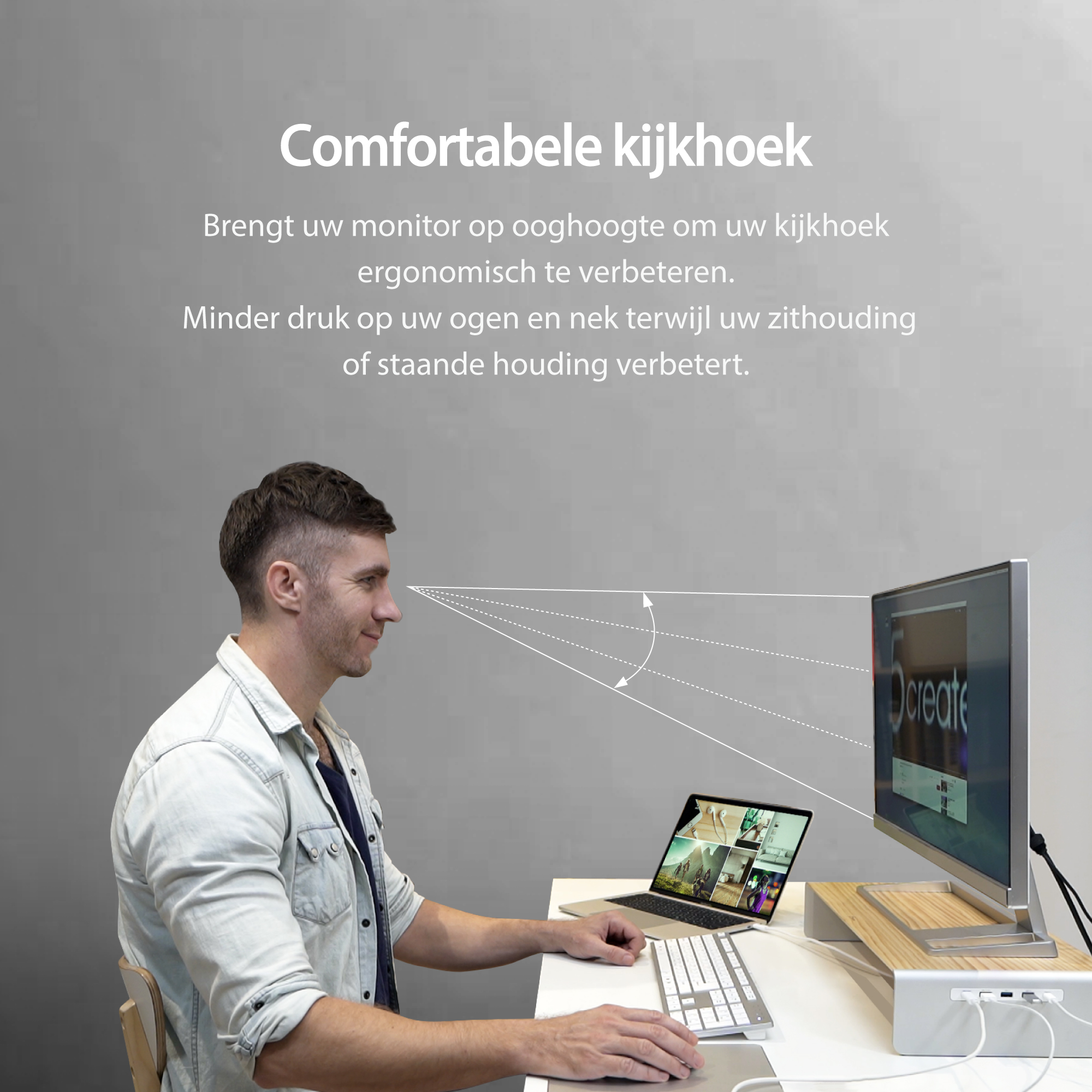 Homme regardant un moniteur sur un support. Ordinateur portable et clavier sur le bureau. Texte sur l'angle de vision confortable.