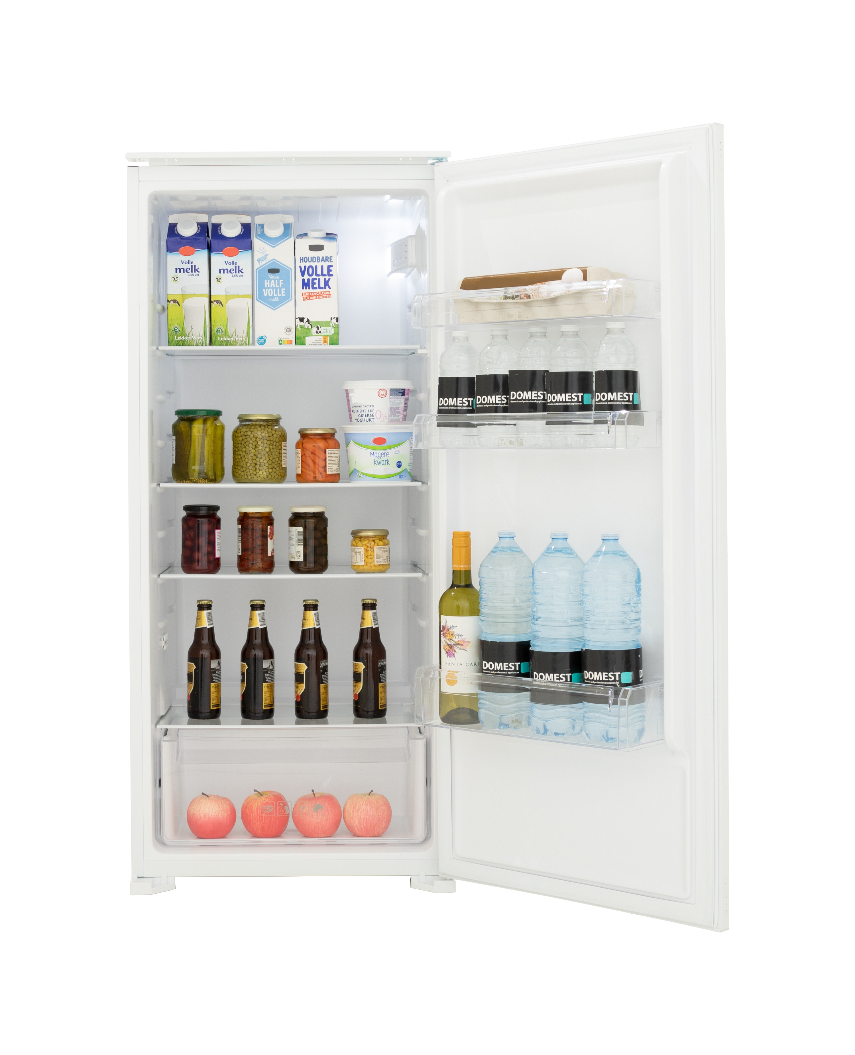 Open white refrigerator filled with groceries, including milk, jars, beer, apples, and water bottles.