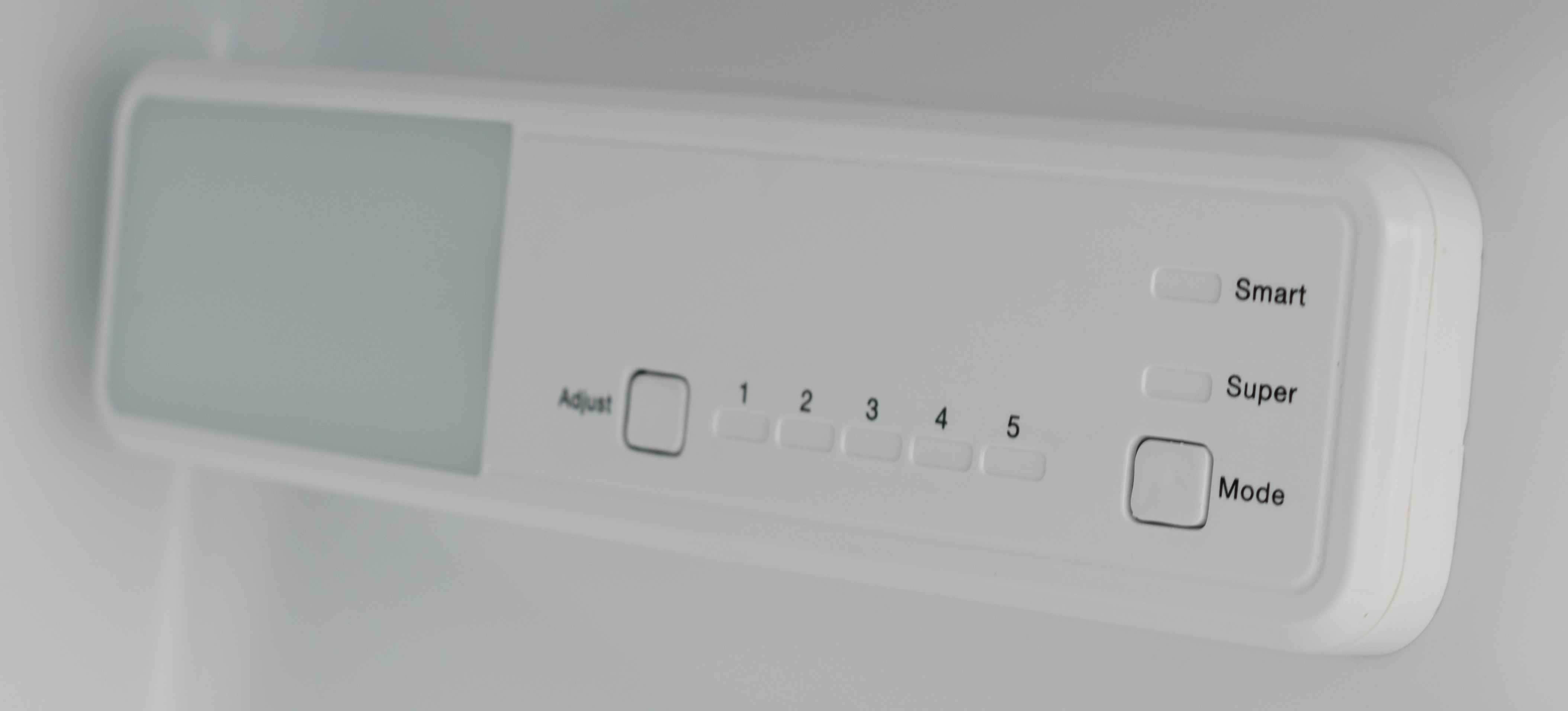 White refrigerator control panel with buttons: 'Adjust', '1-5', 'Smart', and 'Mode'.