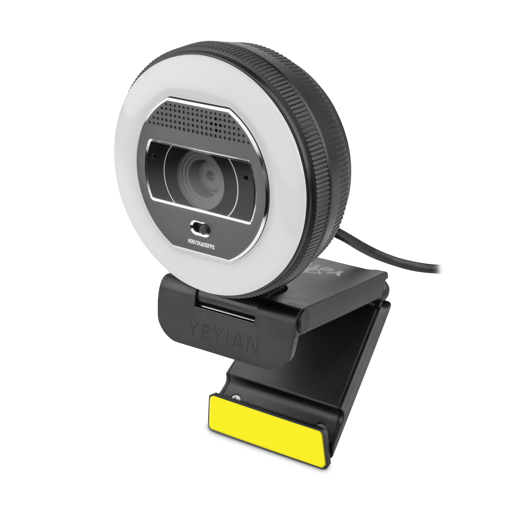 Webcam con luce circolare. Ha un supporto nero con base gialla. Sfondo bianco.