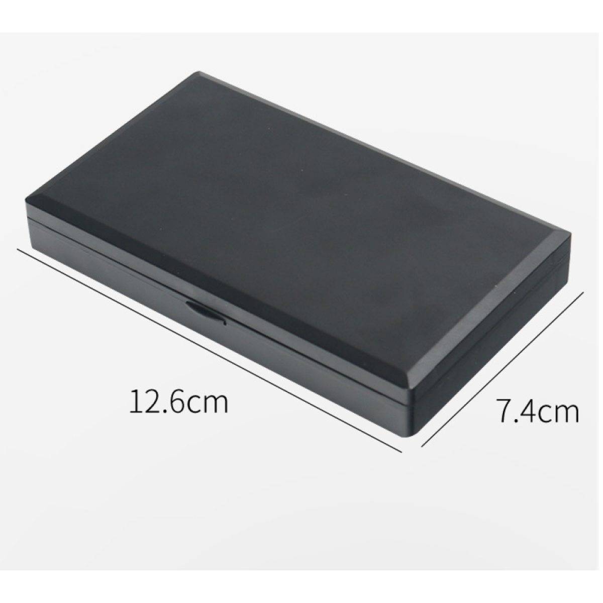 Schwarze rechteckige Box mit beschrifteten Abmessungen. Es ist eine kleine, geschlossene Box.