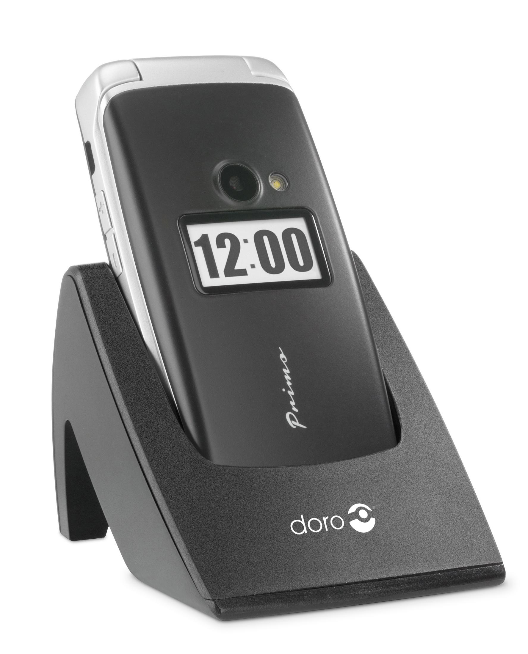 Teléfono plegable negro en una base de carga negra. Se muestra la hora 12:00.