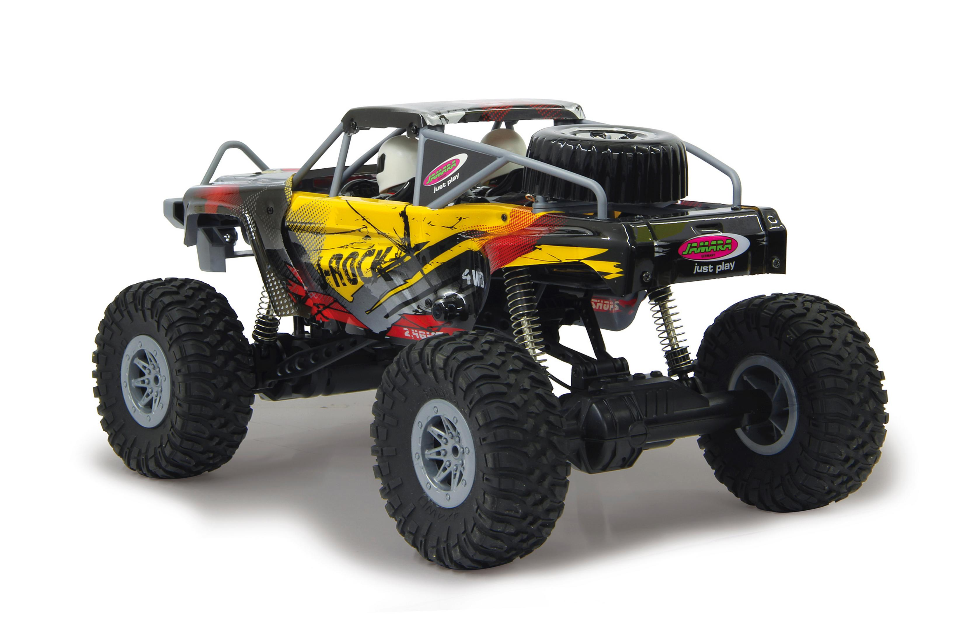 Schwarz-gelbes RC-Rock-Crawler-Spielzeugauto, isoliert auf weißem Hintergrund.