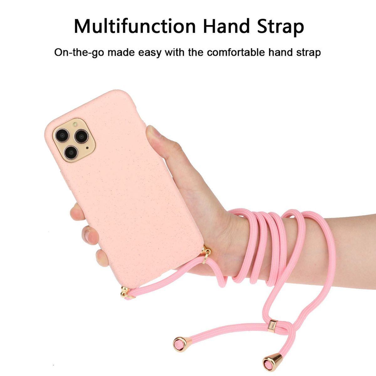 Eine Hand hält ein rosa Telefon mit rosa Band. Der Hintergrund ist weiß.