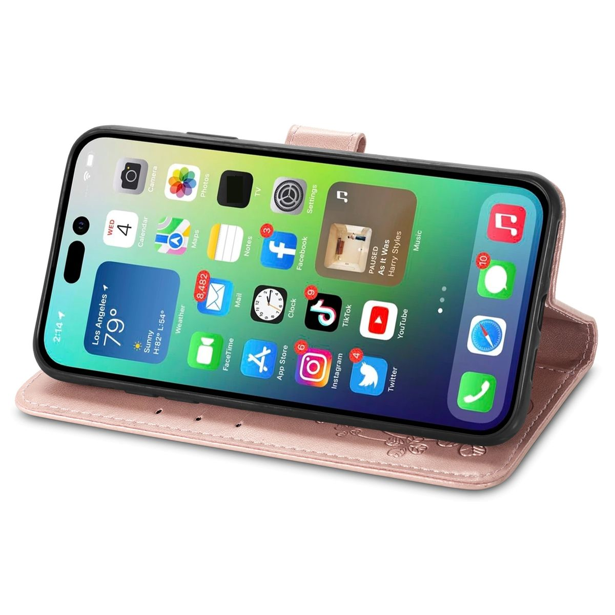 Rosa Handyhülle mit Telefon darin. Das Telefon liegt auf einem Tisch. Die Hülle hat Kartenfächer.