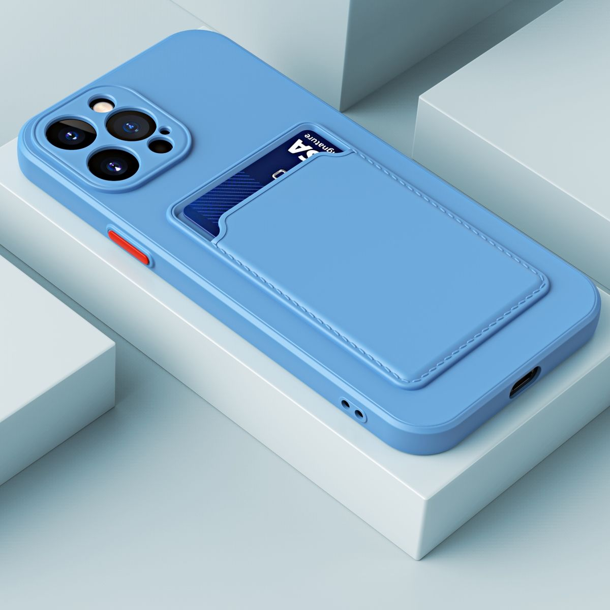 Blaue Handyhülle mit Kartenhalter auf der Rückseite. Eine Kreditkarte ist eingesetzt.